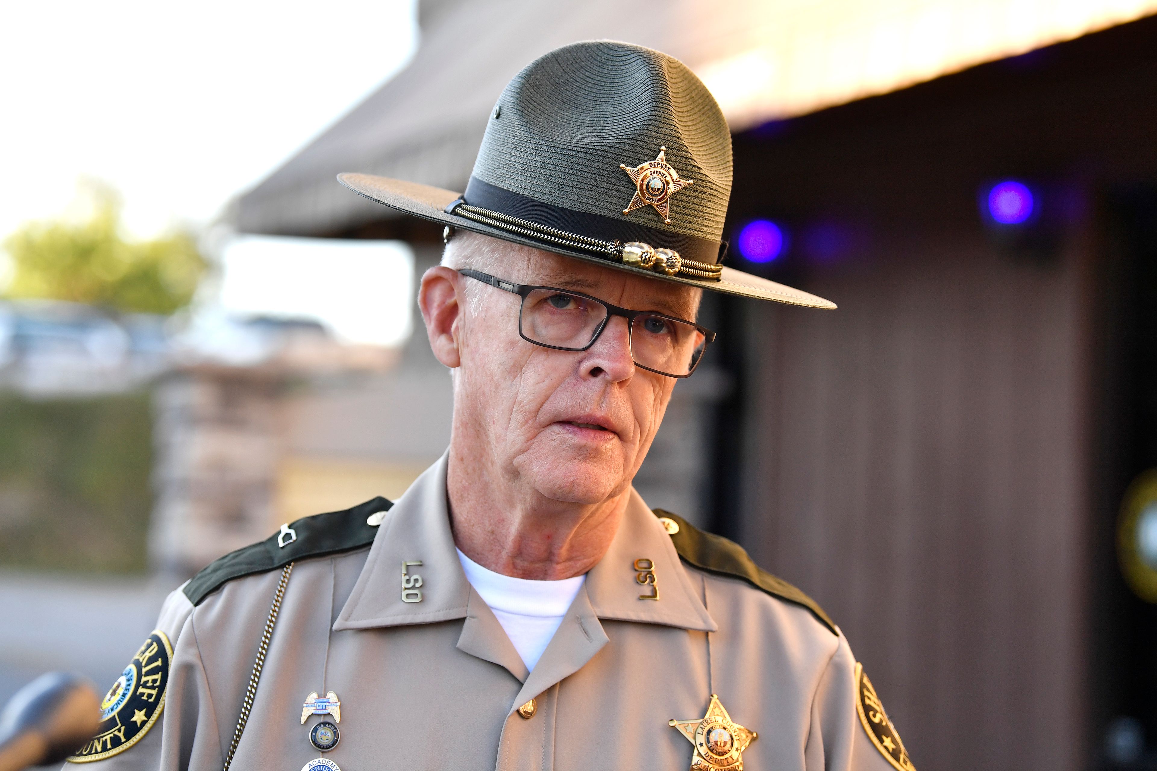 Deputy Gilbert Acciardo, Public information Officer with the Laurel County Sheriff's Office, gives an update on the progress of the search for the suspect linked to the shooting along I-75 in London, Ky., Sunday, Sept. 8, 2024. (AP Photo/Timothy D. Easley)