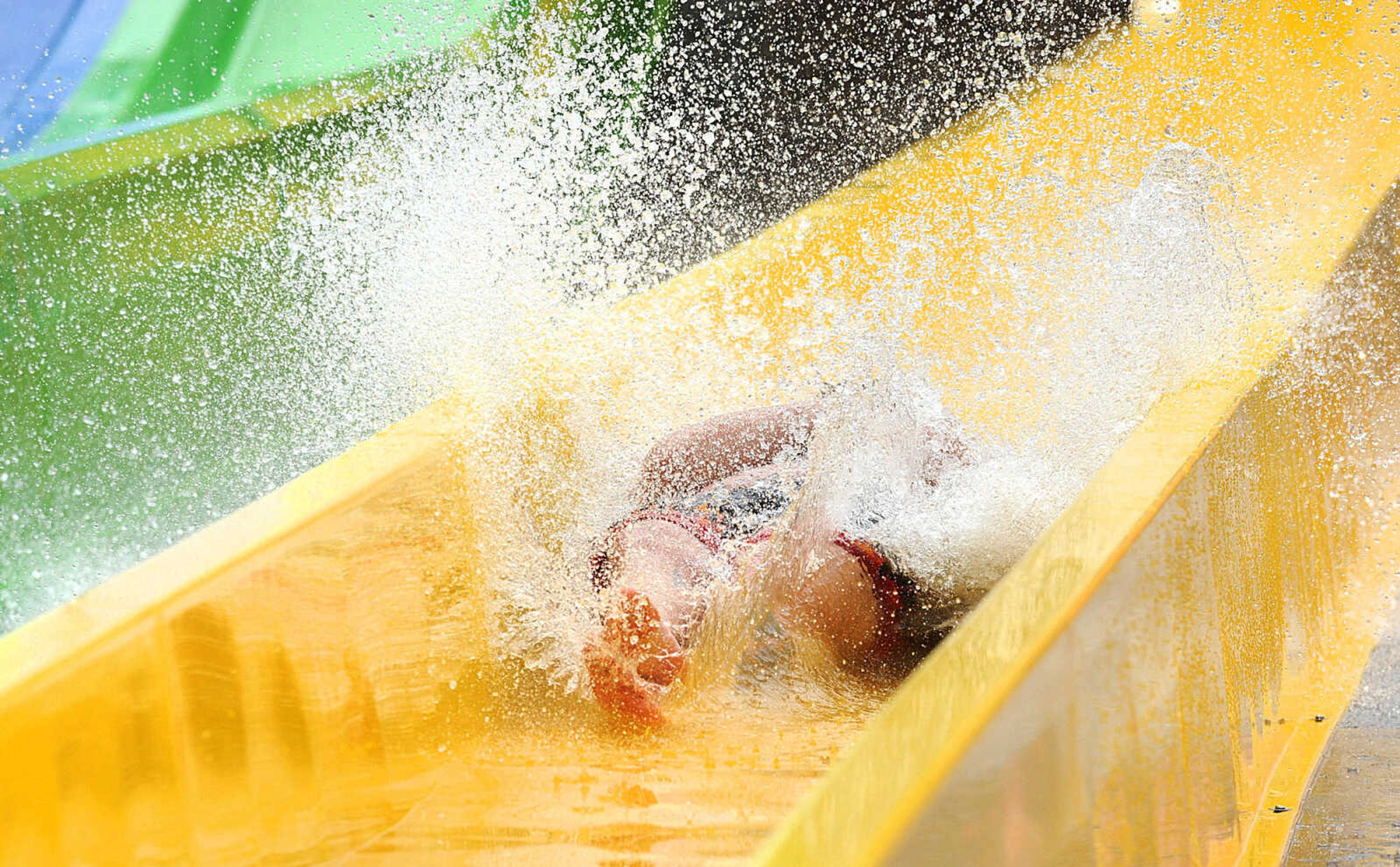 LAURA SIMON ~ lsimon@semissourian.com

The Cape Girardeau Parks and Recreation Department opened the new 265-foot-long free-fall slide, 259-foot-long triple-drop slide and a three-Lane 319-foot-long mat racer with 30-foot tower, at Cape Splash Family Aquatic Center, Thursday, July 9, 2015.