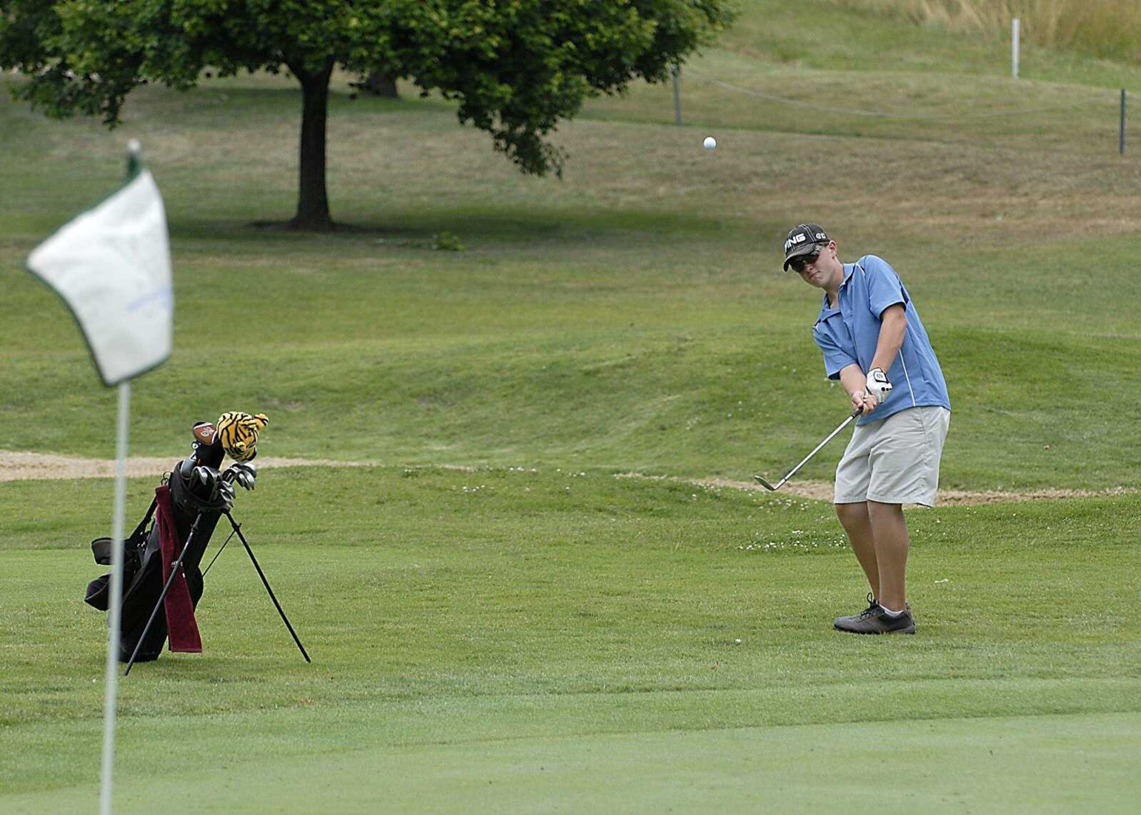 KIT DOYLE ~ kdoyle@semissourian.com
Eric Bennett, 14, chipped onto the first hole green Wednesday, June 25, 2008, during the PGA Gateway Junior Series tournament at Bent Creek in Jackson.