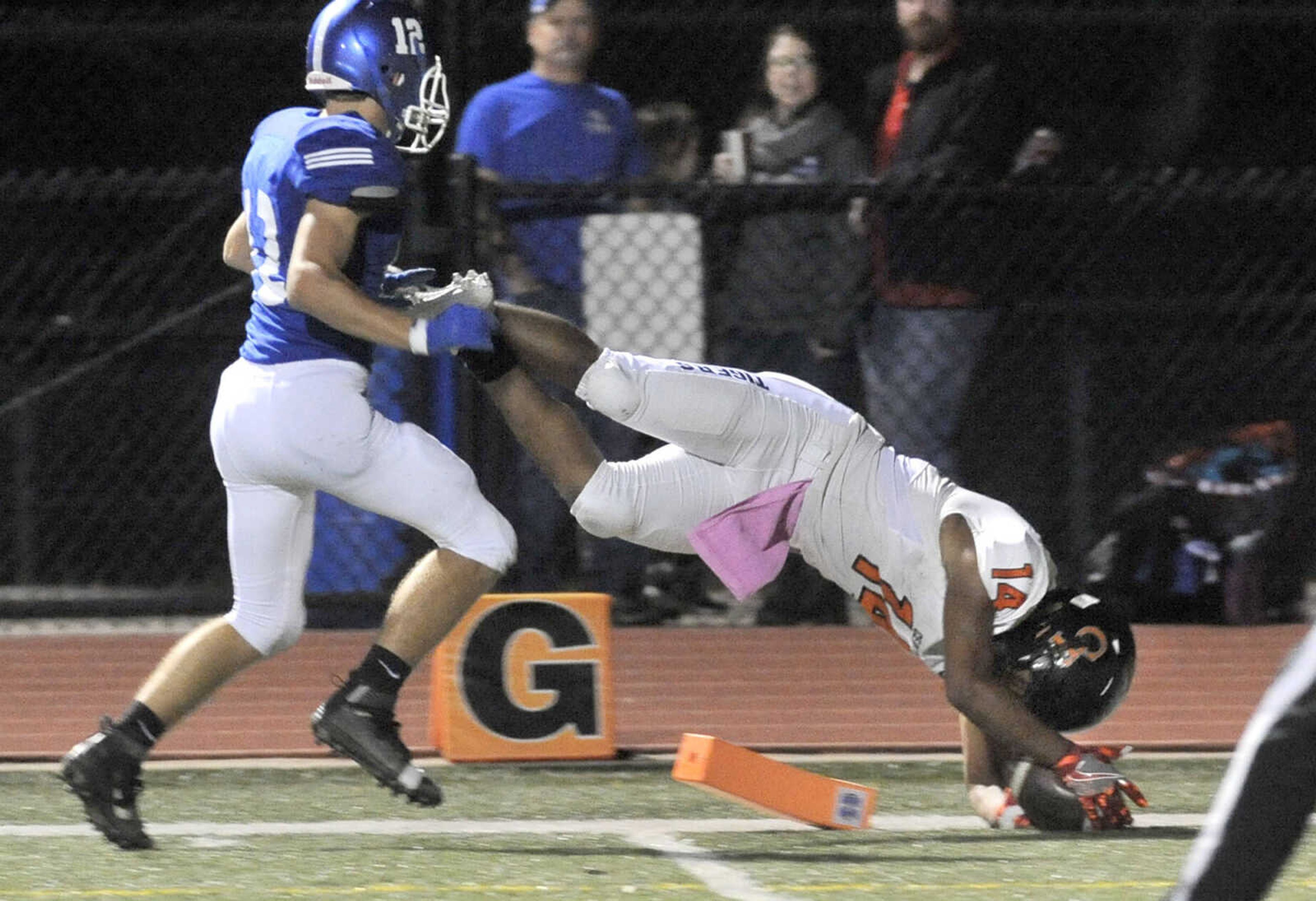 FRED LYNCH ~ flynch@semissourian.com
Cape Girardeau Central's Joseph Baker dives into the end zone with Hillsboro's Tim Scheupbach behind him for the third touchdown against Hillsboro during the first quarter of the Class 4 District 1 championship game Friday, Nov. 4, 2016 in Hillsboro, Missouri.