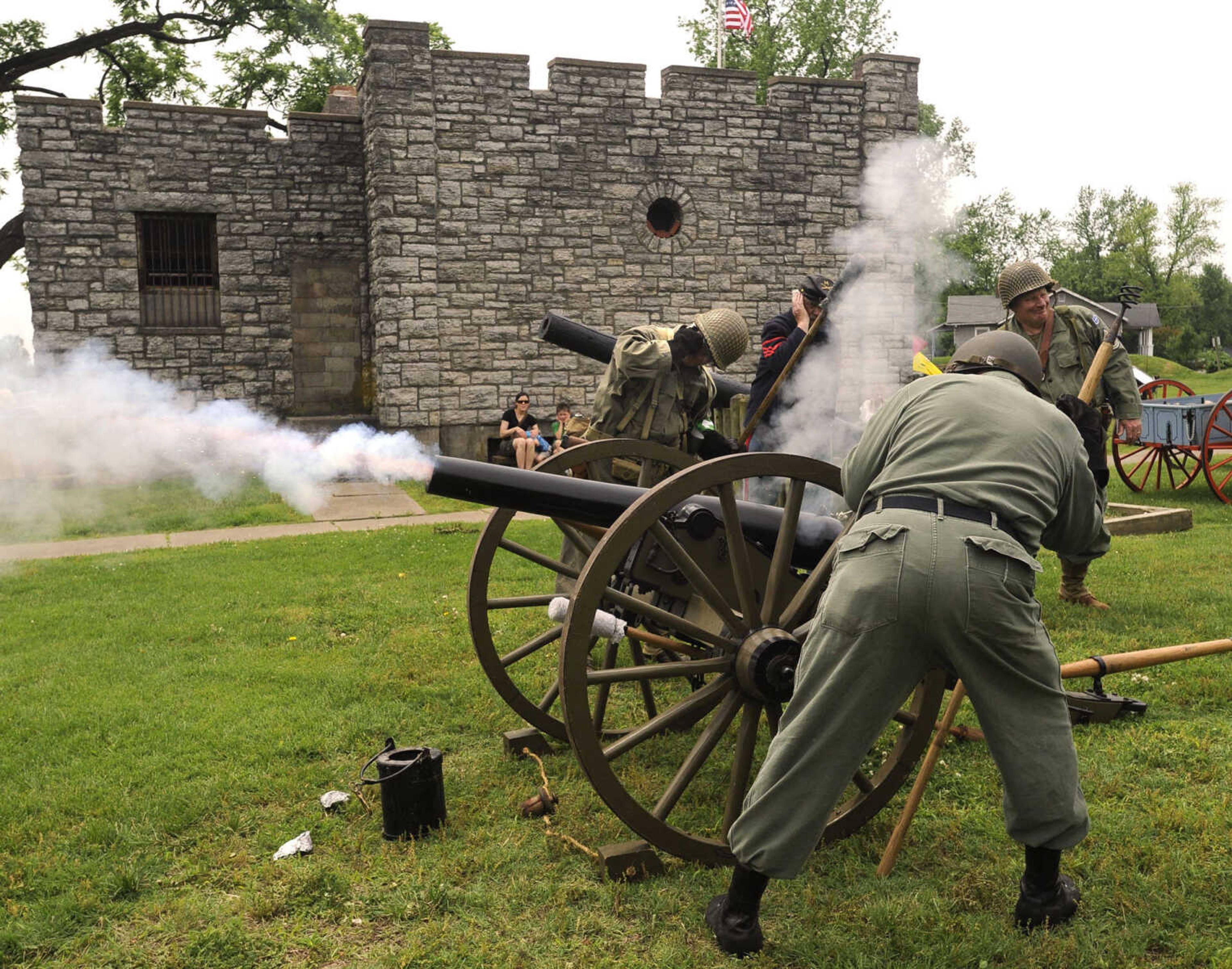 FRED LYNCH ~ flynch@semissourian.com
Members of the SEMO Military Vehicles Group fire a replica of an ordnance rifle Saturday, May 28, 2011 at Fort D historic site in Cape Girardeau.