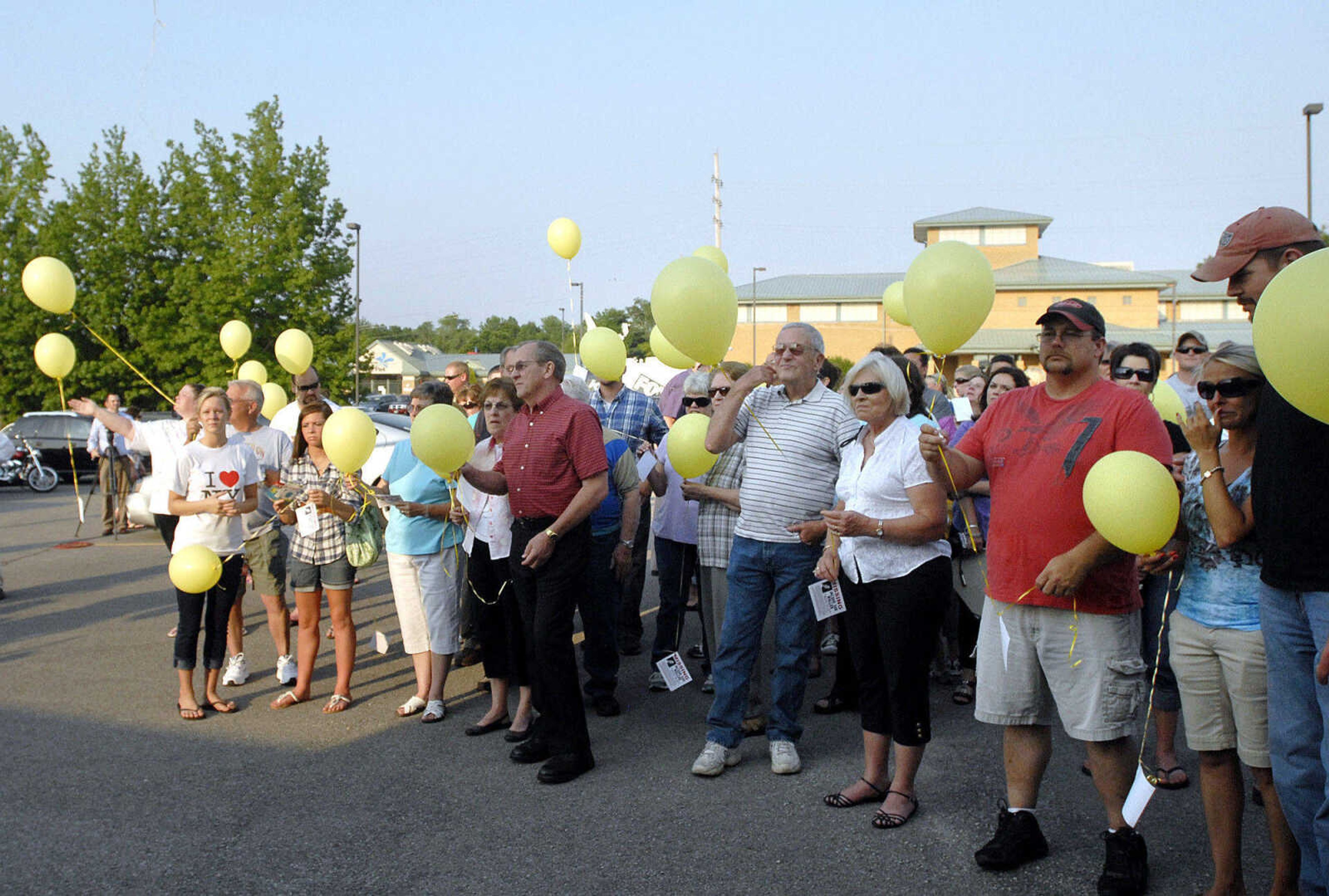 LAURA SIMON~lsimon@semissourian.com
Friends and family of Jacque Sue Waller release balloons with information about Waller attached to them Thursday, June 9, 2011 during a prayer service for Waller at Farmington High School. Waller, a 39-year-old mother of three, has been missing since June 1, 2011.