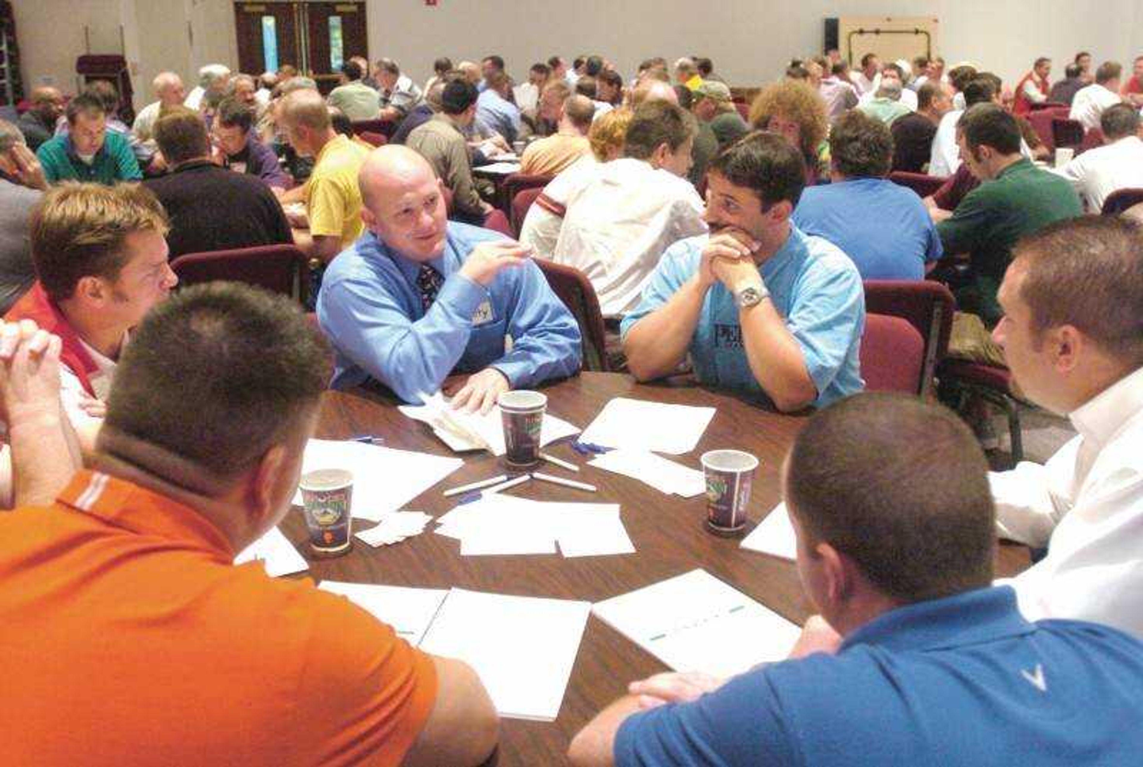 Dr. Scott B. Smith took a turn in a small group discussion following a video presentation that kicked off the Men's Fraternity program at LaCroix United Methodist Church on Sept. 15, 2005. (Fred Lynch)