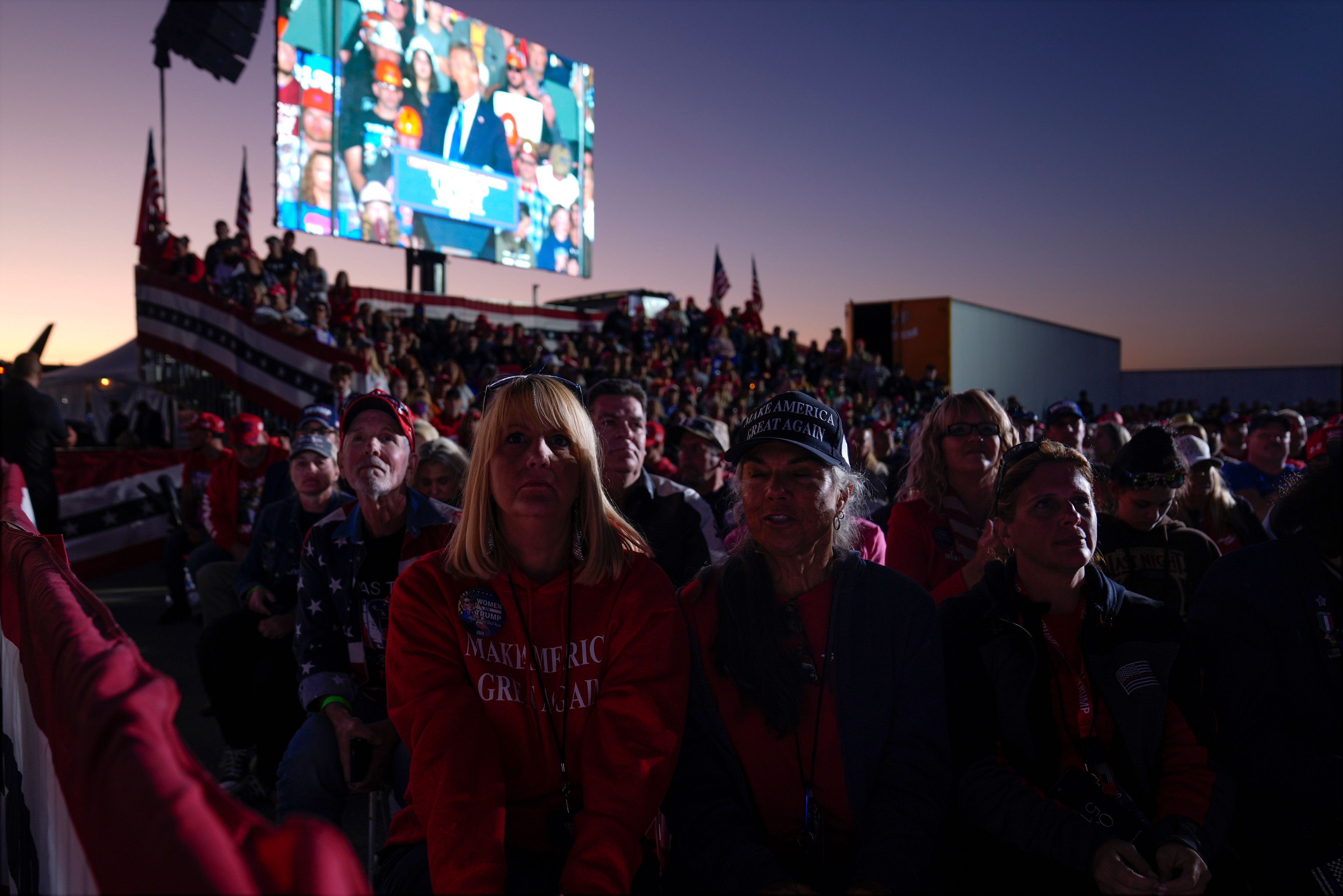 Supporters listen as Republican presidential nominee former President Donald Trump speaks during a campaign rally at Arnold Palmer Regional Airport, Saturday, Oct. 19, 2024, in Latrobe, Pa. (AP Photo/Evan Vucci)