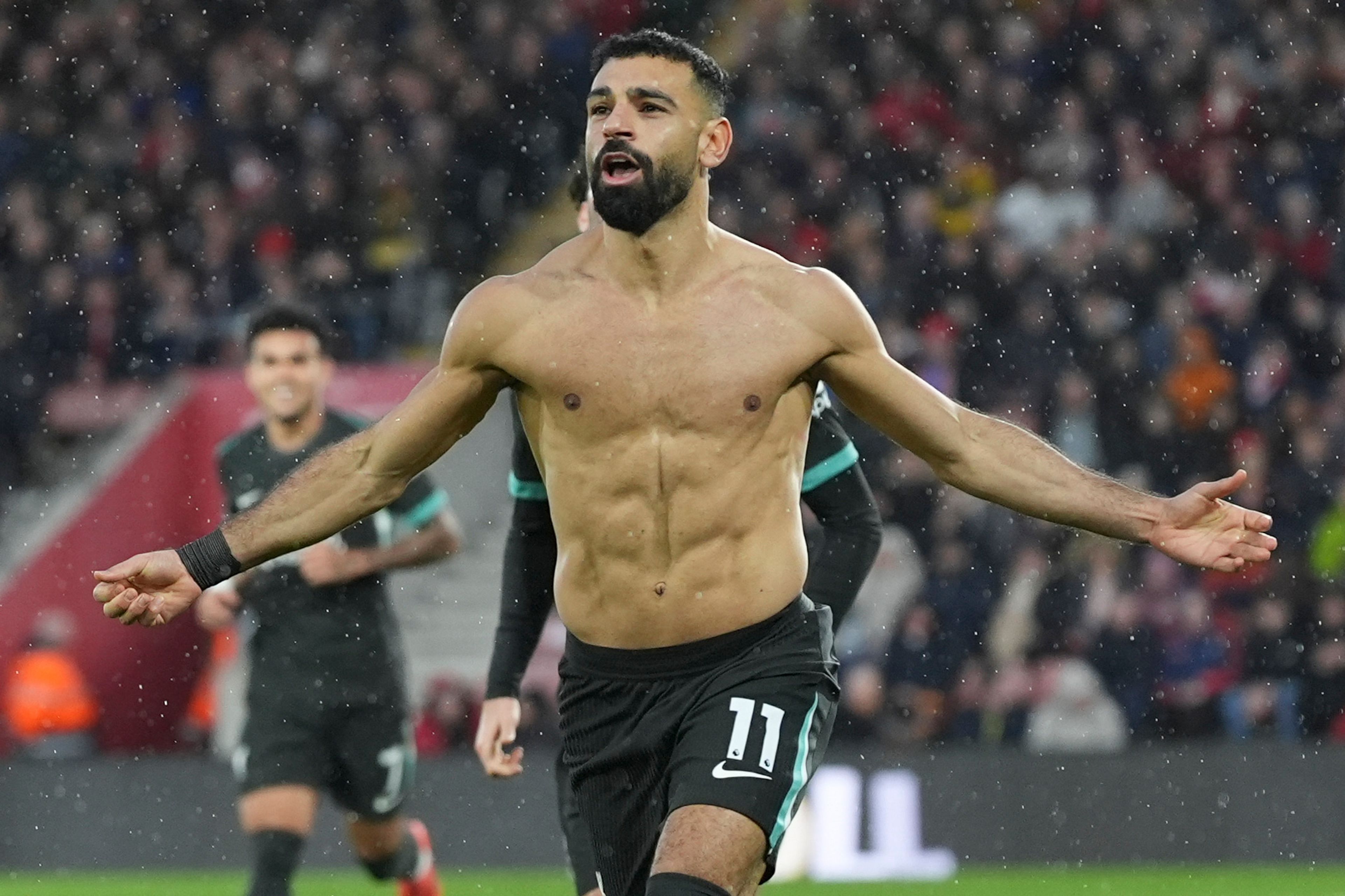 Liverpool's Mohamed Salah celebrates after scoring during the English Premier League soccer match between Southampton and Liverpool in Southampton, England, Sunday, Nov. 24, 2024. (AP Photo/Sean Ryan)