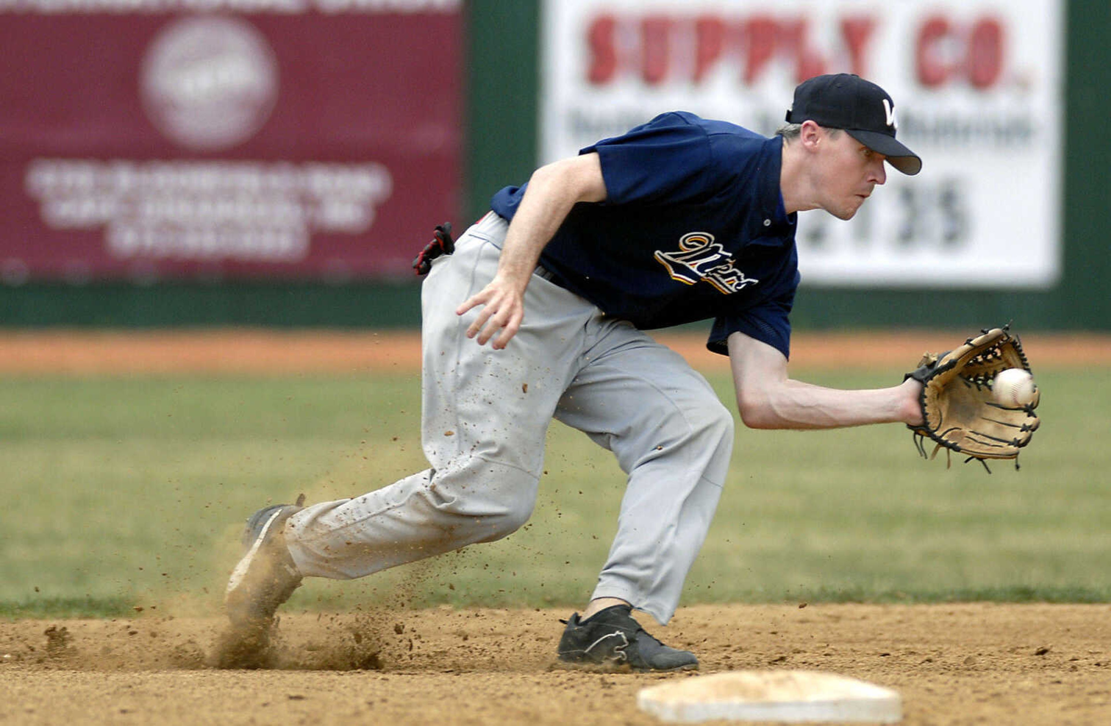 KIT DOYLE ~ kdoyle@semissourian.com
Waterloo second baseman Jake F'derich scoops up a grounder Saturday, June 13, 2009, at Capaha Field.