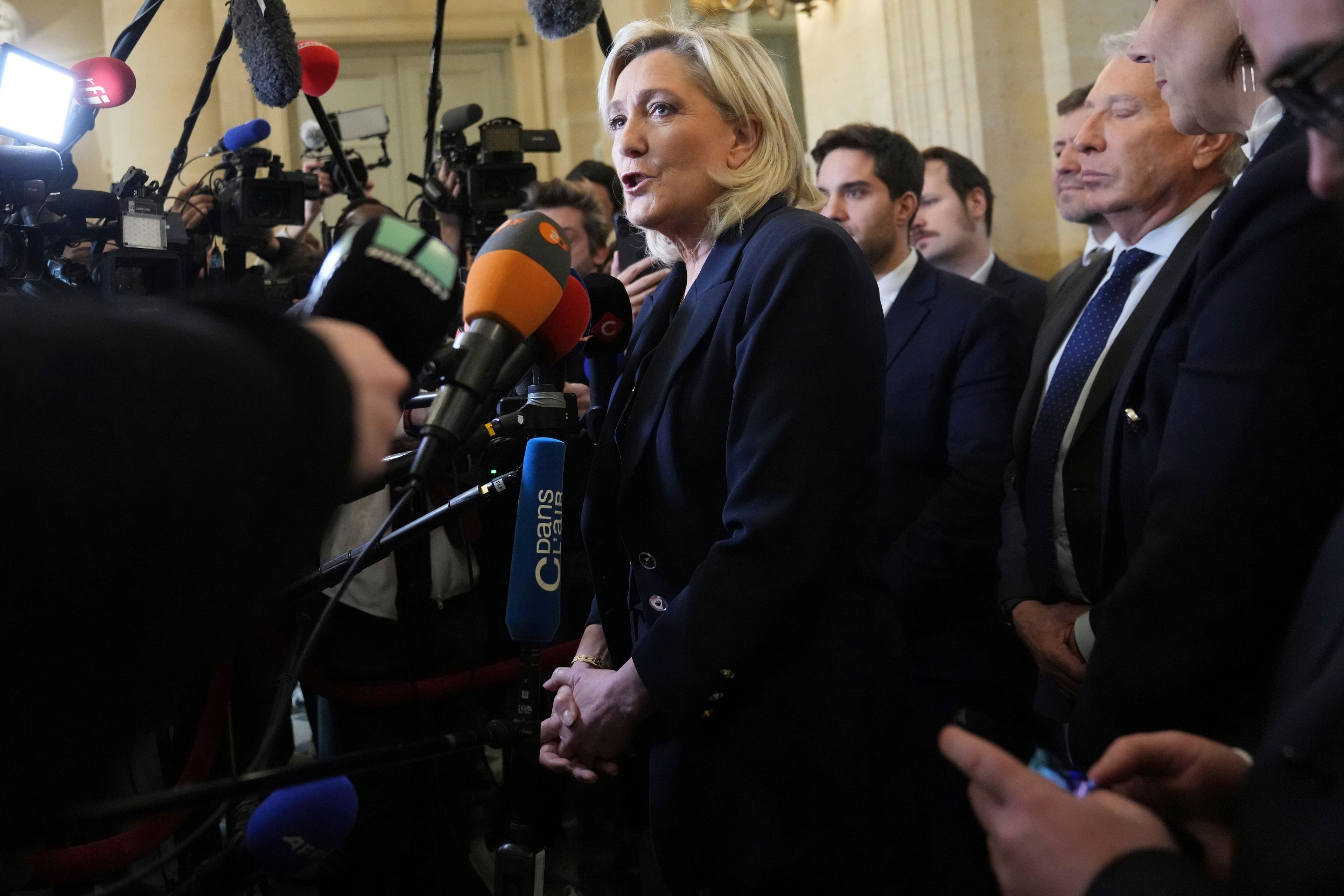 French lawmakers vote to oust prime minister in the first successful no-confidence vote since 1962