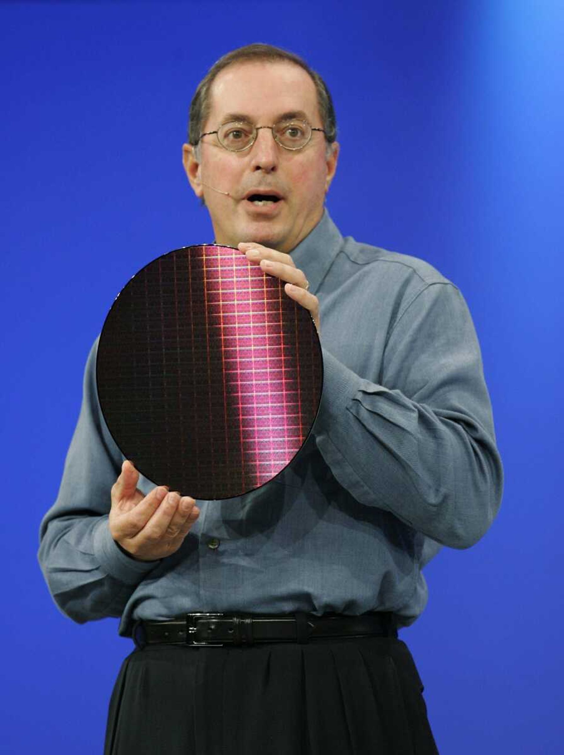 Intel Corp. chief executive Paul Otellini showed off a wafer of new chips with billions of transistors Sept. 18 at the Intel Developers Forum in San Francisco. (Paul Sakuma ~ Associated Press)