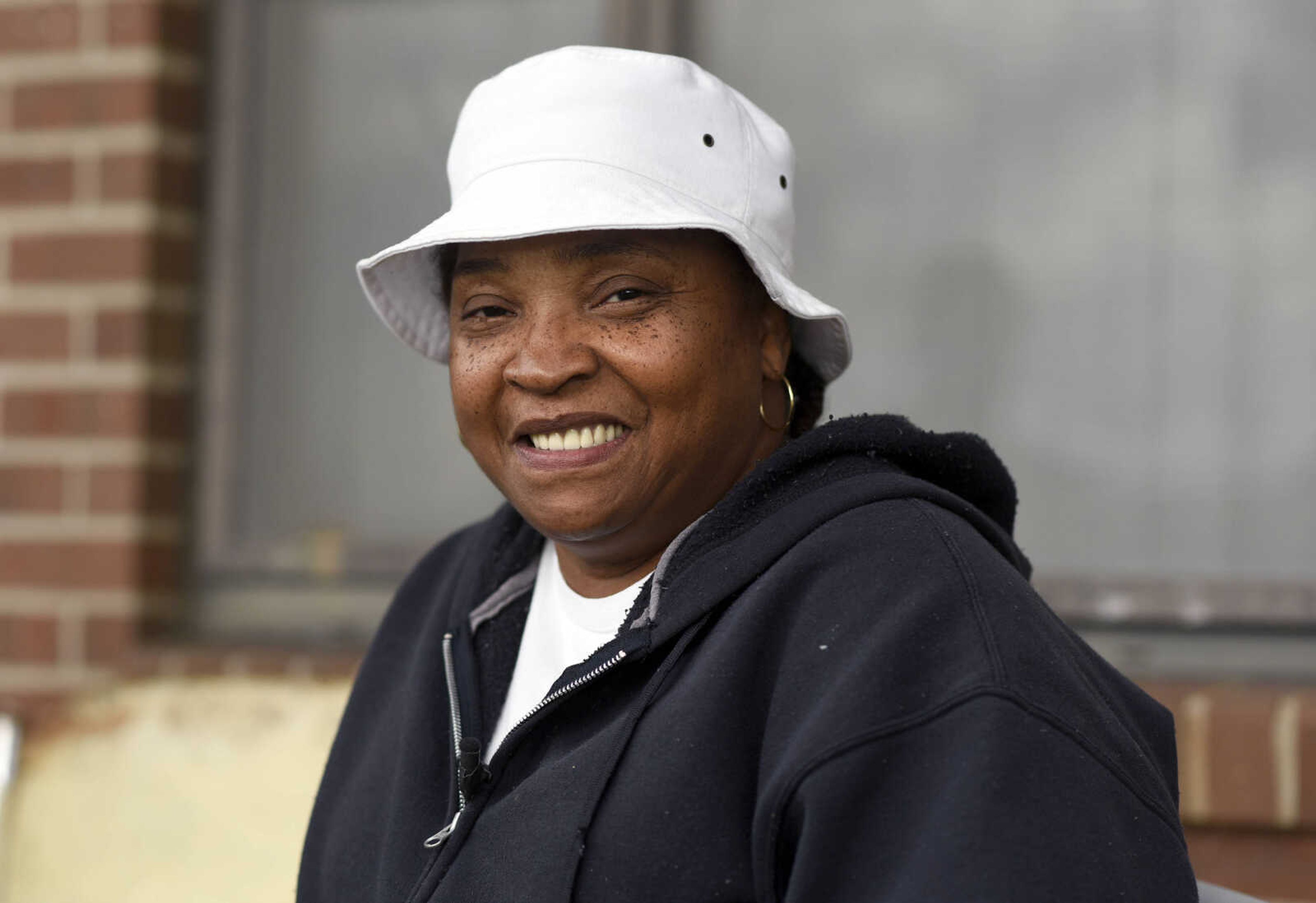 LAURA SIMON ~ lsimon@semissourian.com

Denise Mills poses for a portrait in Sikeston, Missouri in September. Mills said she was at her uncle's house at 333 Dixie Street for a fish fry on Aug. 5, 2000.