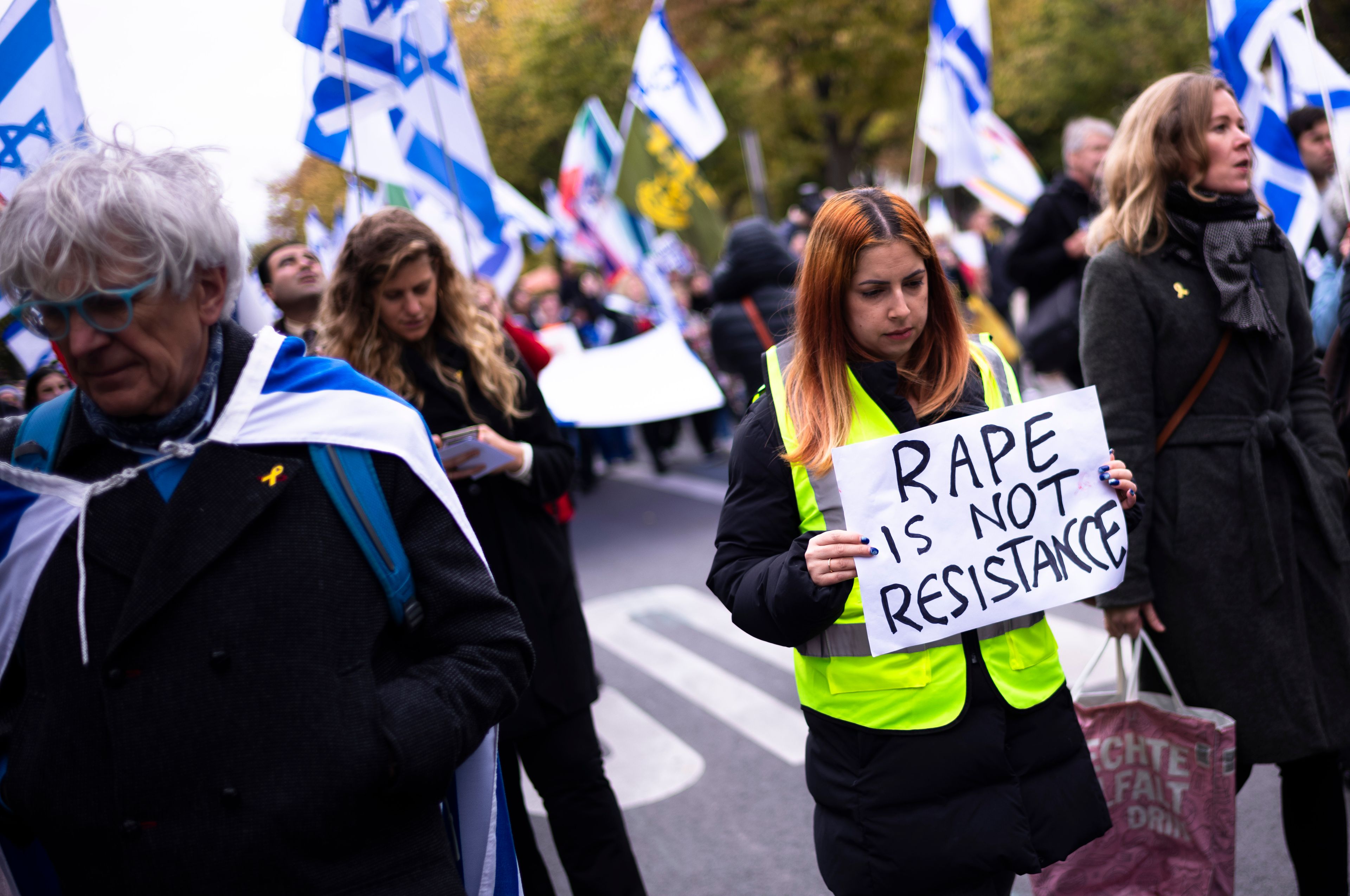 People attend a demonstration in support of Israel to mark the first anniversary of the Hamas attack on Israel, in Berlin, Germany, Sunday, Oct. 6, 2024. (AP Photo/Markus Schreiber)