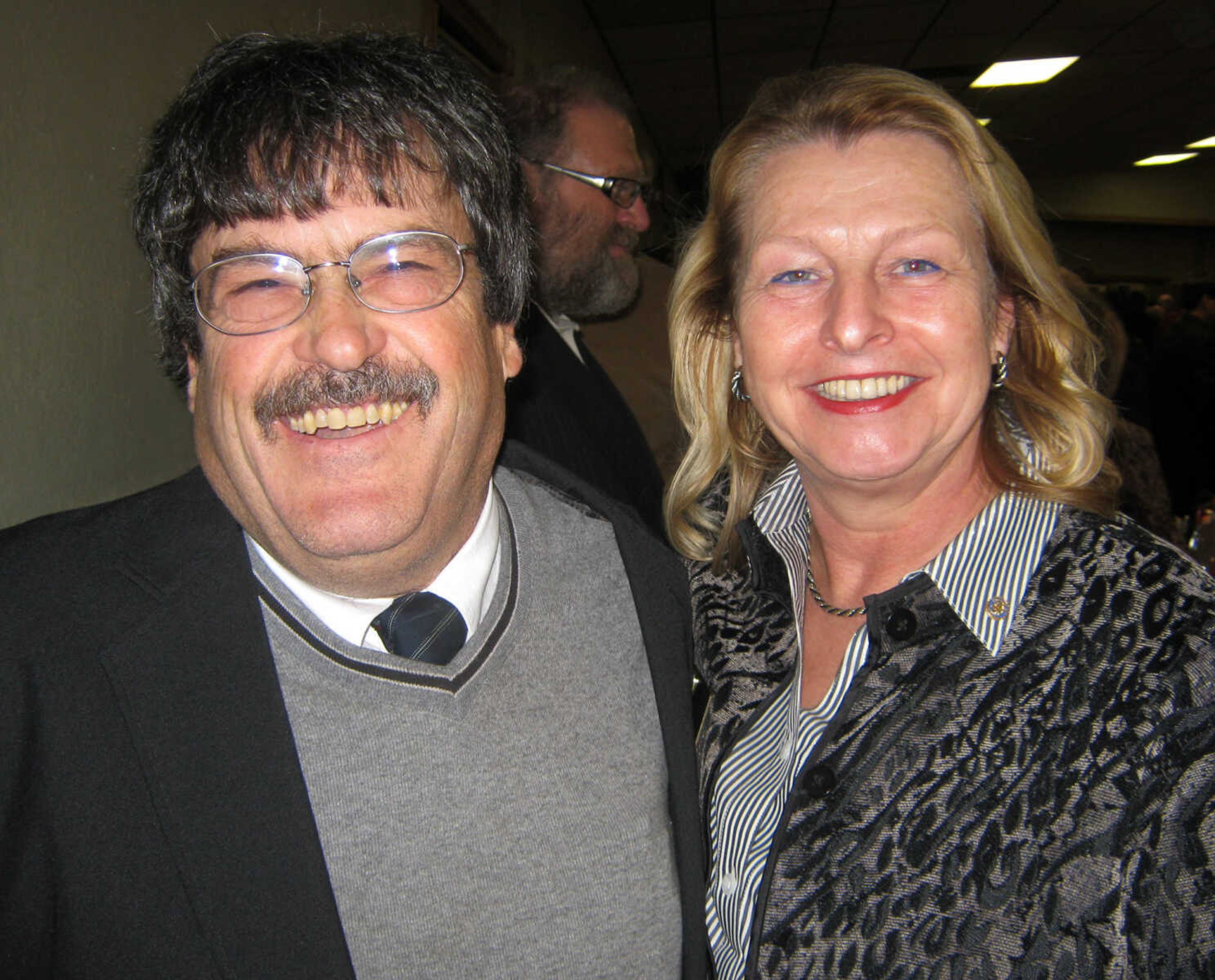 David Bloom, Cash-Book Journal, left; and Brigitte Bollerslev, Jackson Rotary, pose at the Jackson Area Chamber of Commerce annual awards banquet, Jan. 11, at the the Knights of Columbus Hall in Jackson, Mo.