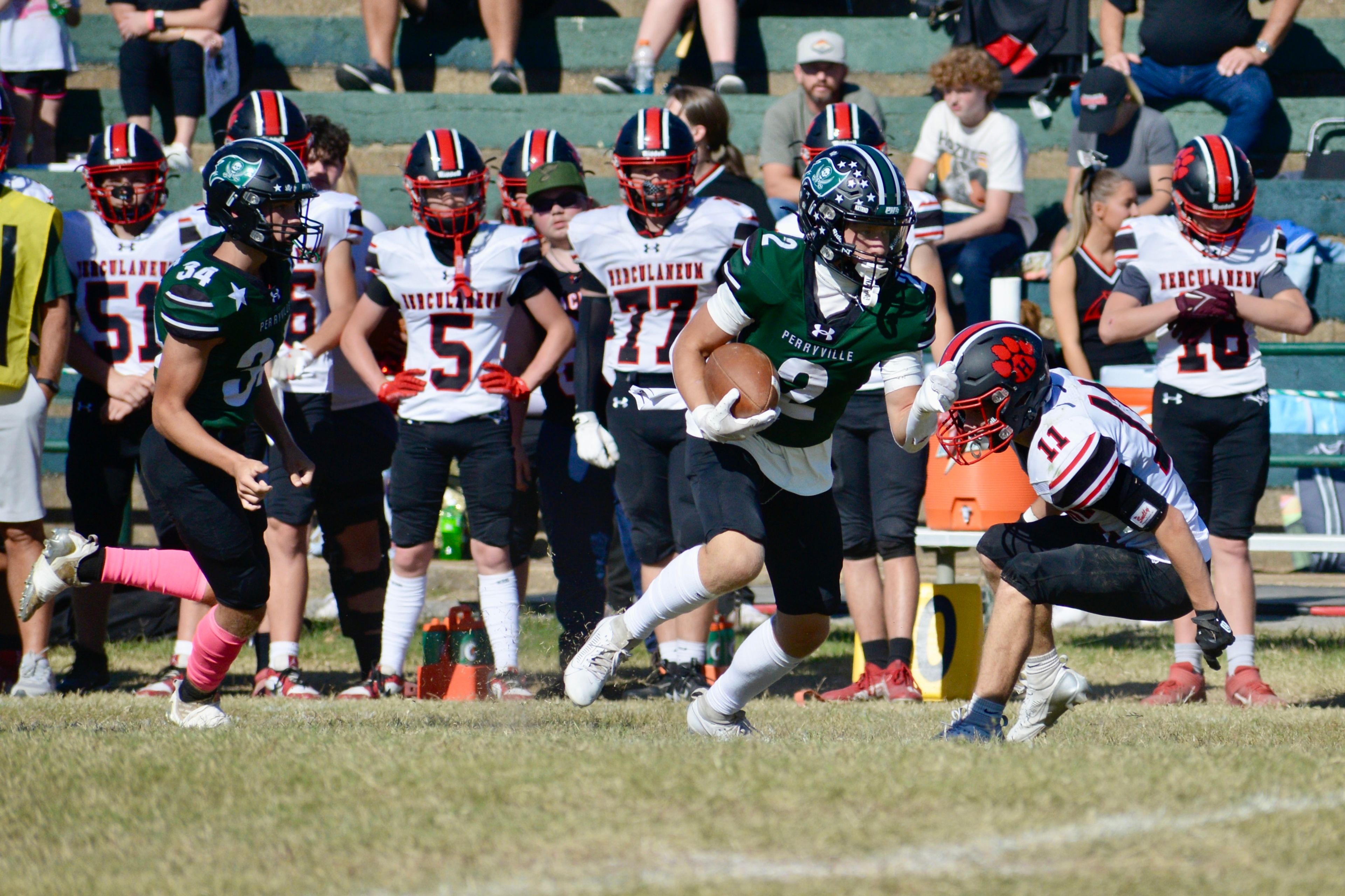 Perryville receiver Chase Richardet carries the ball after catching a pass against Herculaneum on Saturday, Oct. 19, in Perryville. 