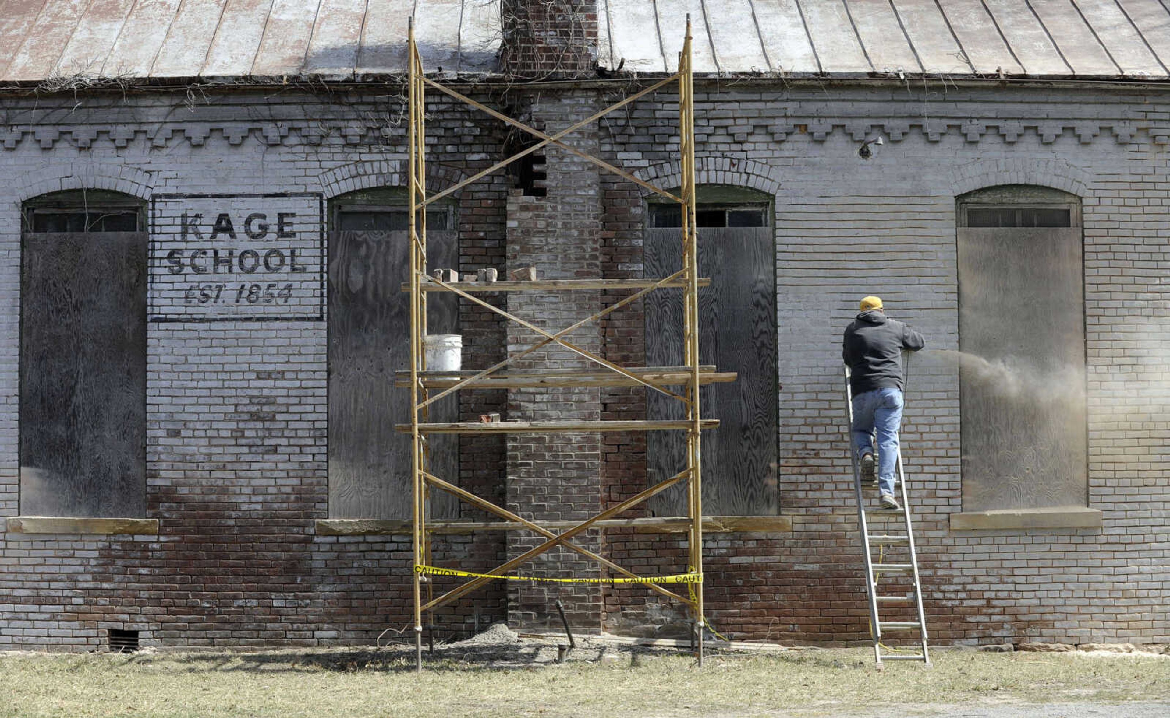 Restoration of the old Kage School is underway Monday, March 24, 2014 in Cape Girardeau. The building's owner, Rick Hetzel, said he bought the former one-room school from Keith Deimund and plans to repurpose it into a 2-bedroom home. The building itself dates from 1880, replacing a log structure that stood since 1854. Classes continued until 1966.