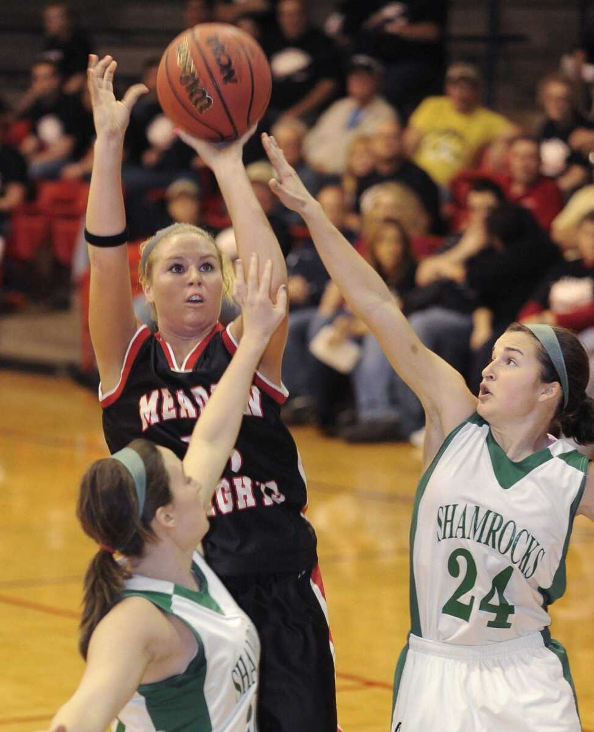 Meadow Heights senior Whitney Welker shoots during the first quarter Wednesday.