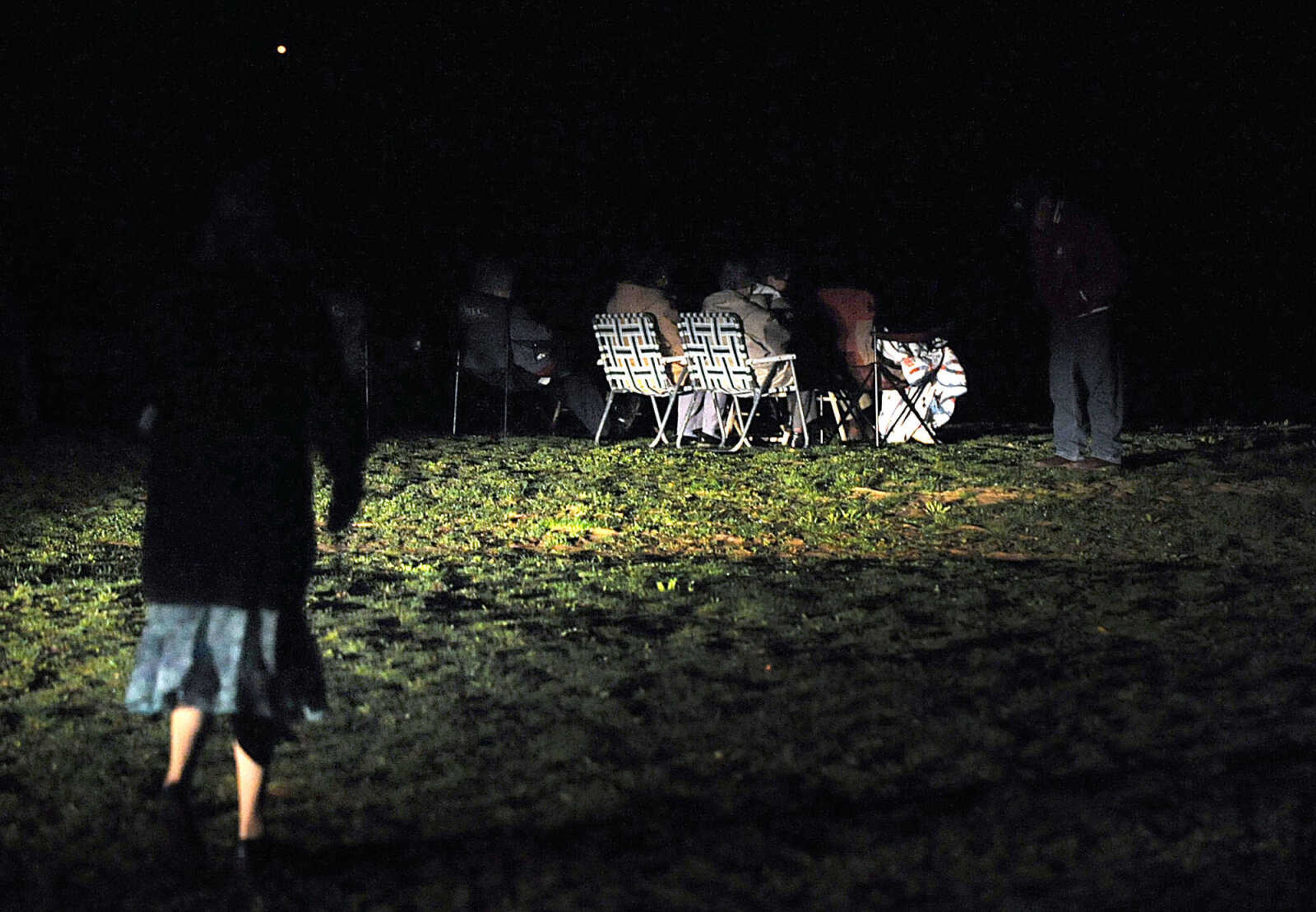 LAURA SIMON ~ lsimon@semissourian.com

Headlights act as a spotlight for a parishioner making their way towards the seating for Burfordville Baptist Church's Easter sunrise service along the bank of the Whitewater River Sunday morning, March 31, 2013 at Bollinger Mill State Historic Site.