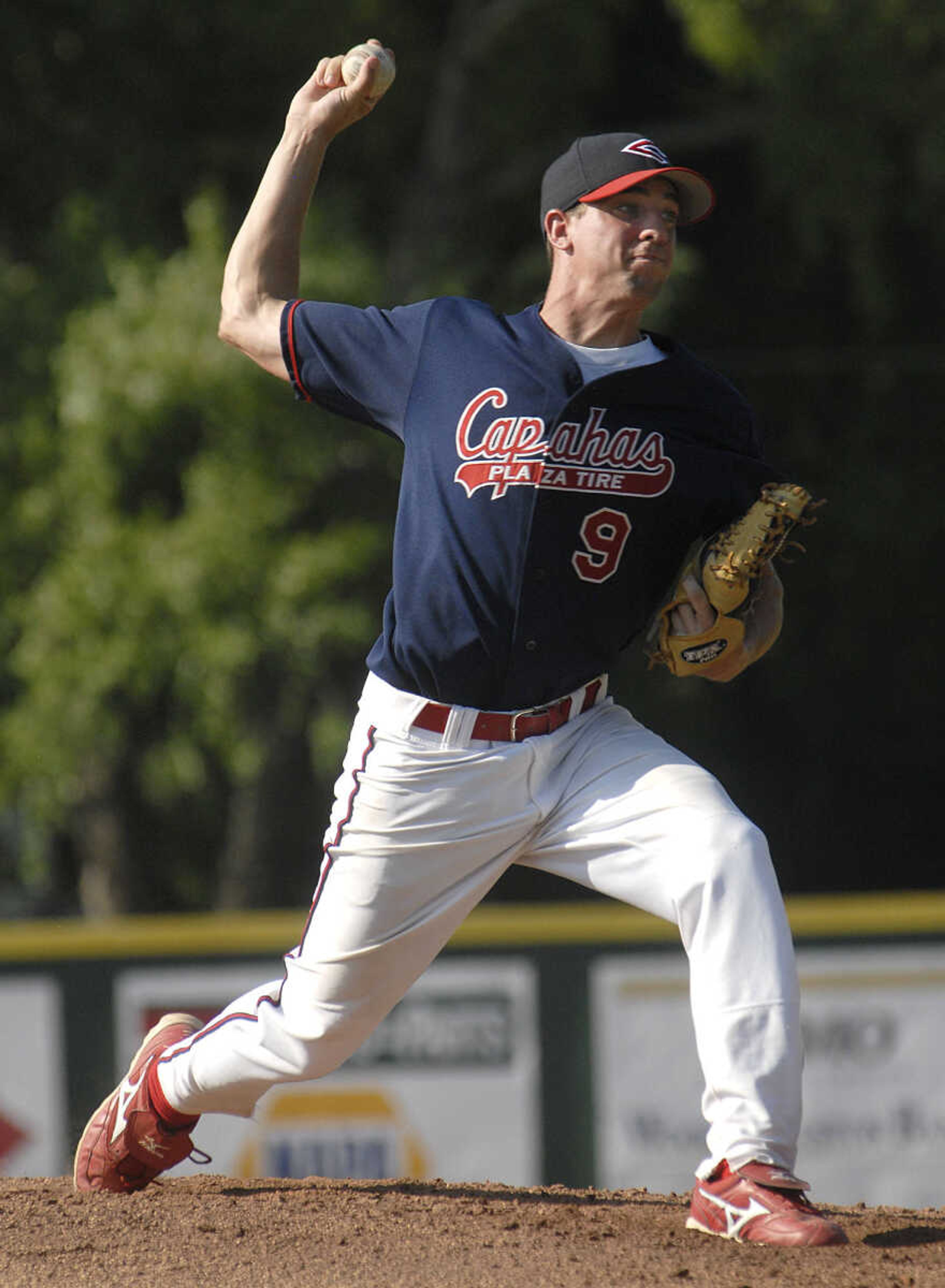 Capahas starting pitcher Kirk Boeller delivers to a Riverdogs batter in the first game Sunday at Capaha Field.