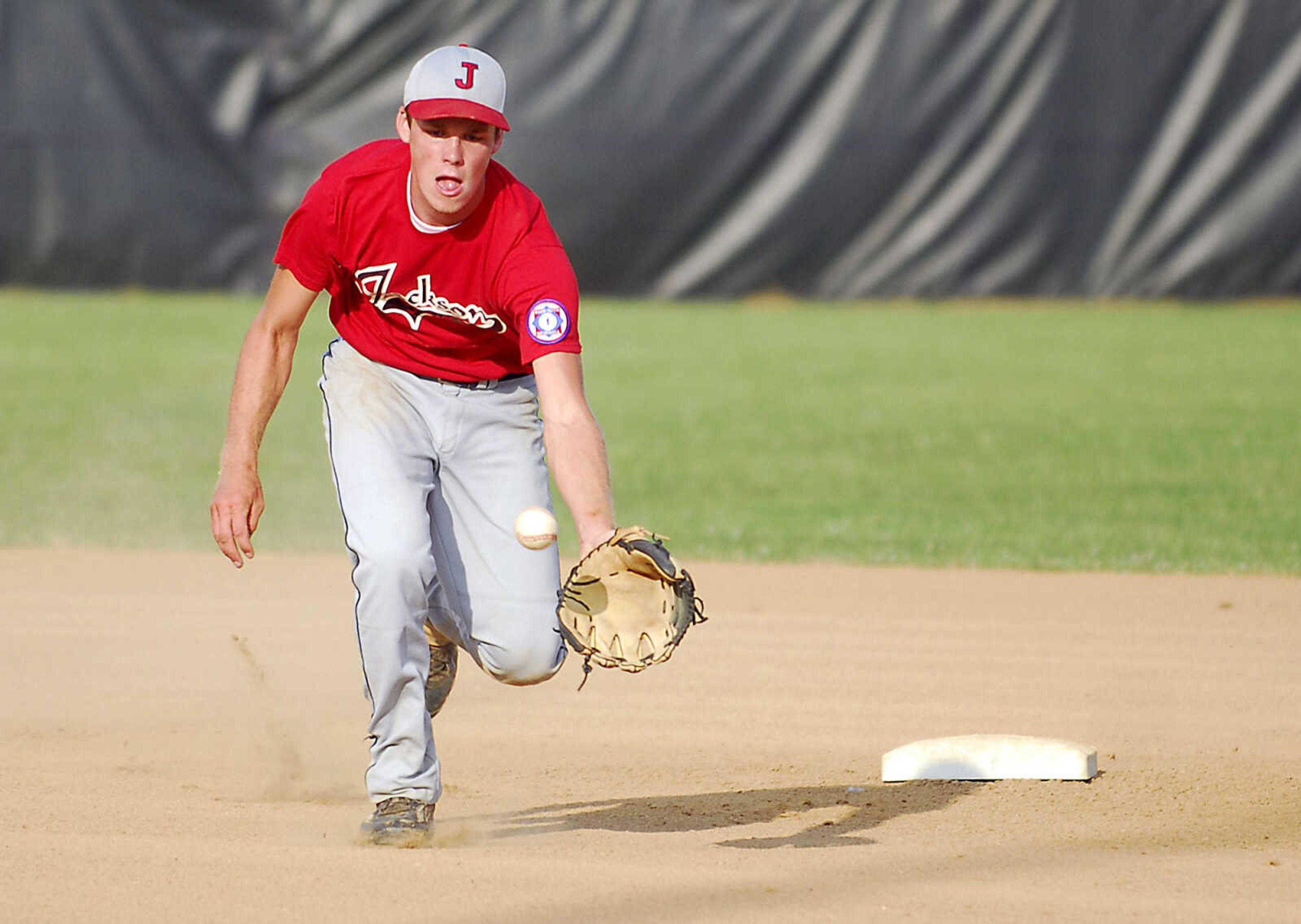 KIT DOYLE ~ kdoyle@semissourian.com
Jackson shortstop Garrett Fritsche comes across the infield for a ball Monday evening, July 6, 2009, in a Senior Babe Ruth game at Jackson City Park.