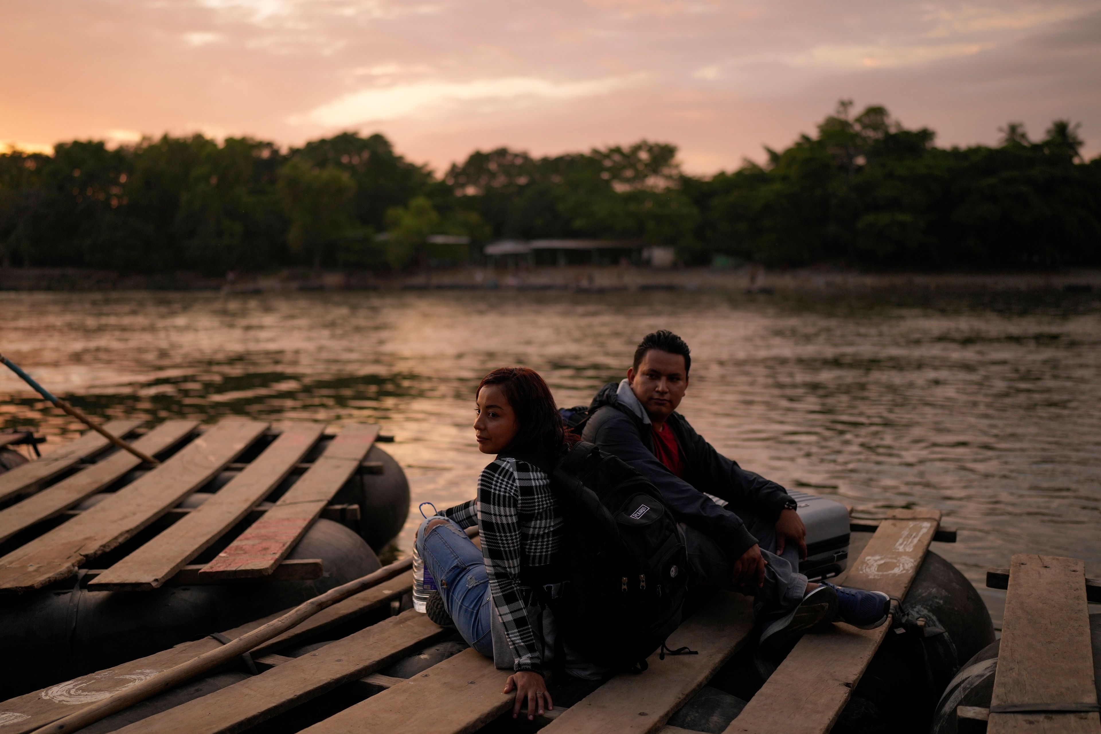 Salvadoran migrant Maria Garcia and her boyfriend cross the Suchiate River, which marks the border between Guatemala and Mexico, from Tecun Uman, Guatemala, Monday, Oct. 28, 2024. (AP Photo/Matias Delacroix)