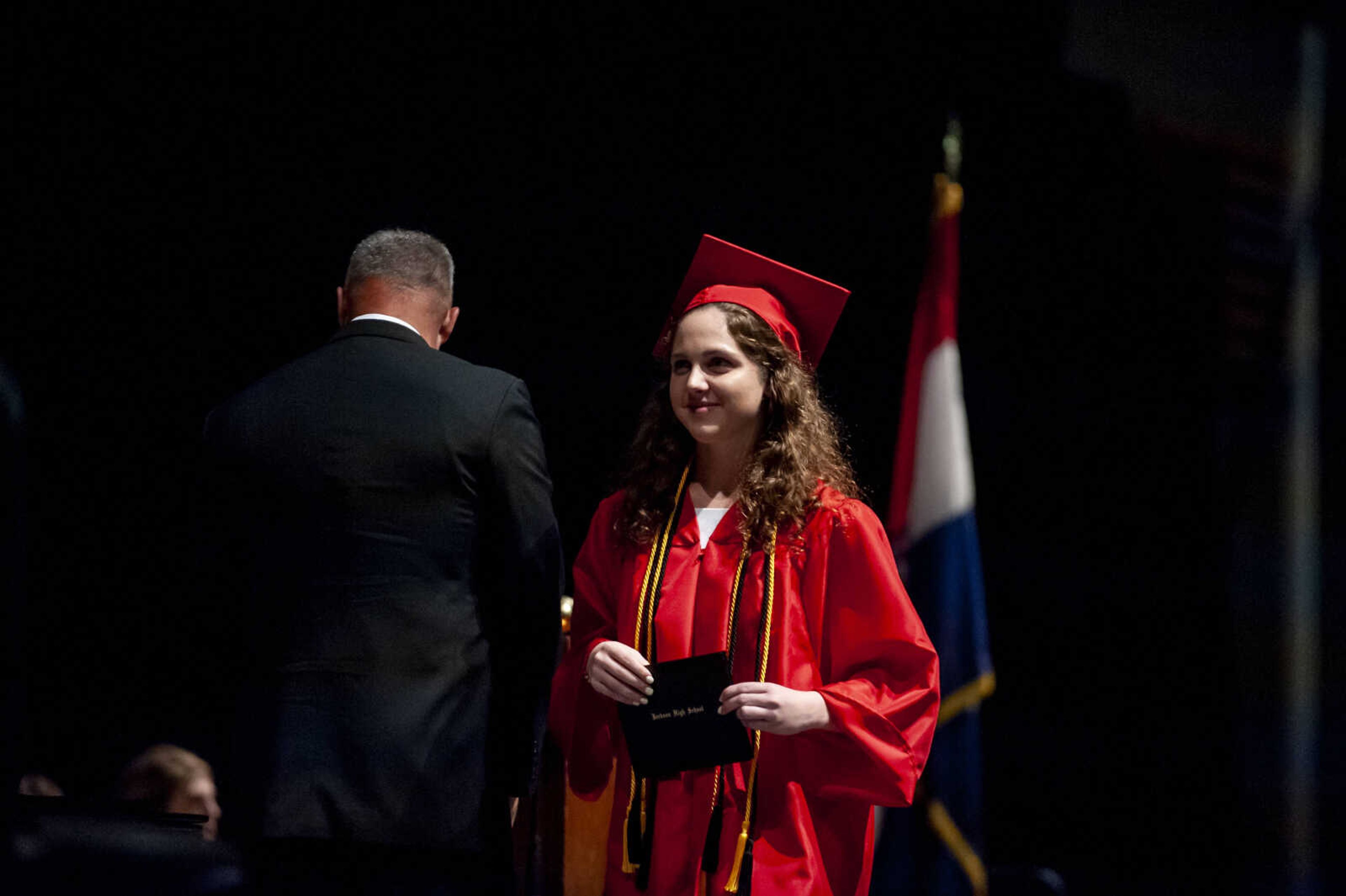 Faith Littleton walks across the stage after receiving her diploma during the Jackson High School Class of 2019 Commencement at the Show Me Center Friday, May 24, 2019, in Cape Girardeau.