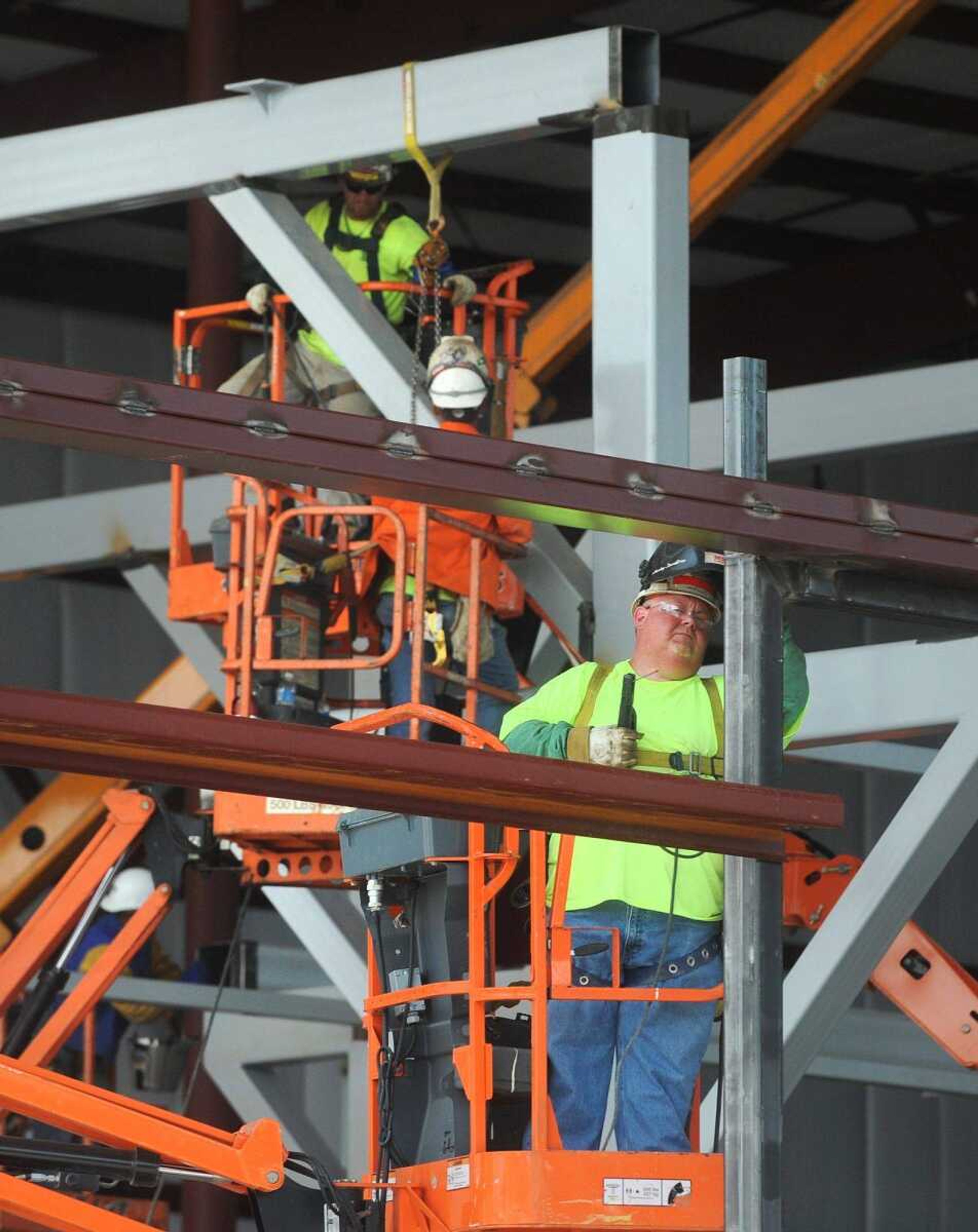 Construction workers continue work Tuesday on a 72,000-square-foot expansion of TG Missouri in Perryville, Missouri. (Laura Simon)