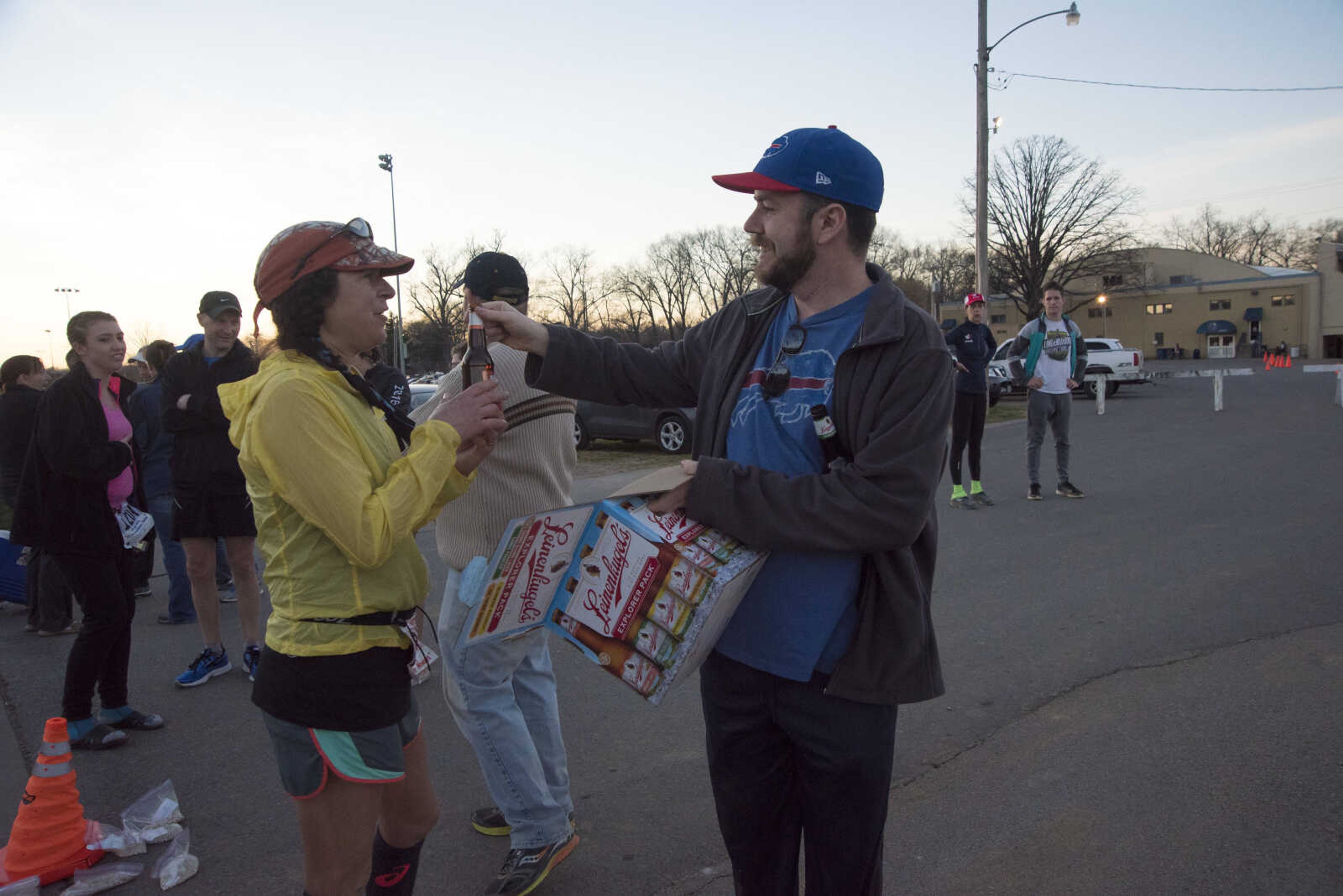 Annette Bednosky takes a beer after completing the 8th annual Howard Aslinger Endurance Run on Saturday, March 18, 2017 in Cape Girardeau. The event raises money for the Howard L. Aslinger Memorial Scholarship where runners will keep running until they can't anymore with the event starting at 7 p.m. Friday night going for 24 hours until Saturday night.