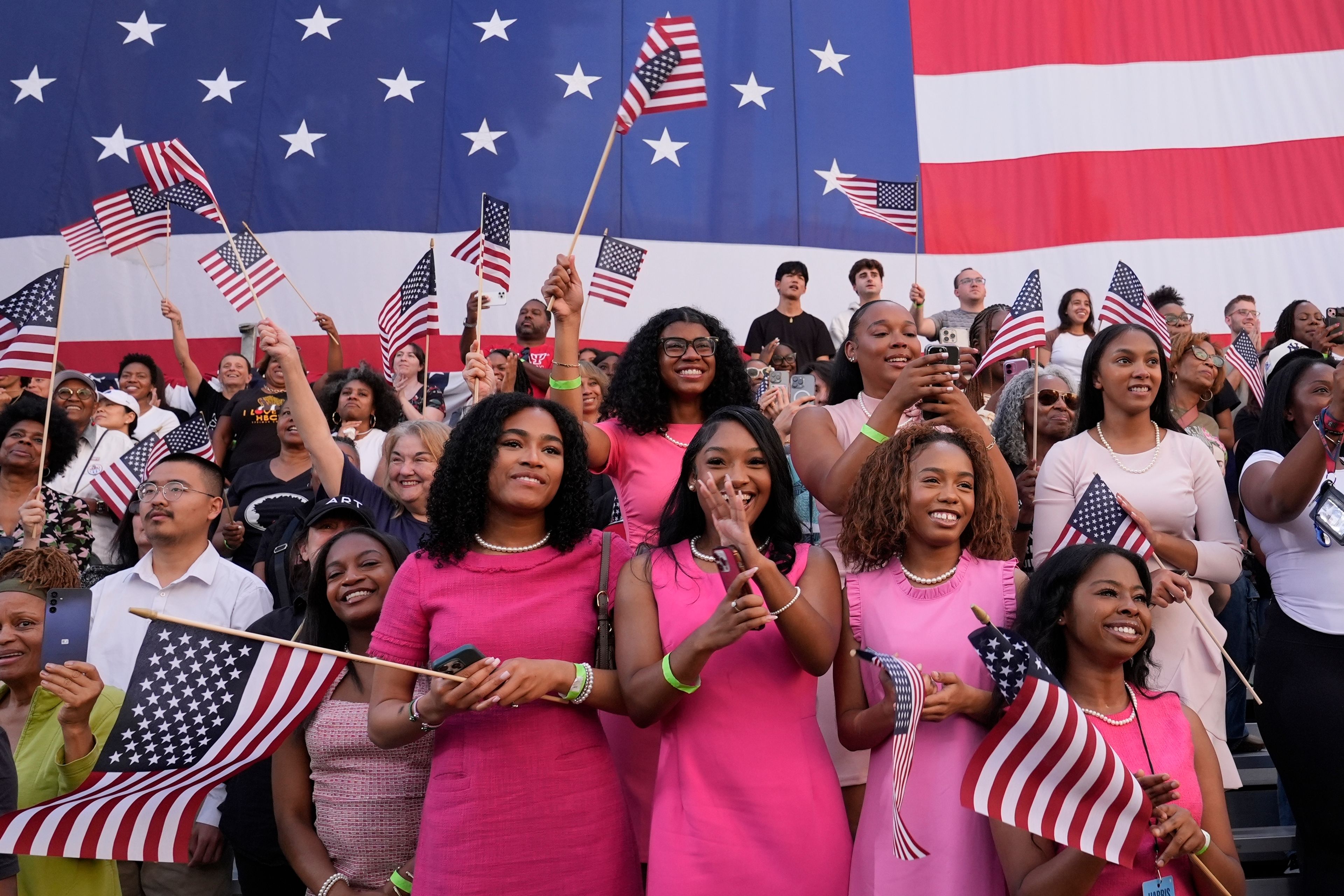 Supporters look on as Vice President Kamala Harris delivers a concession speech for the 2024 presidential election, Wednesday, Nov. 6, 2024, on the campus of Howard University in Washington. (AP Photo/Susan Walsh)