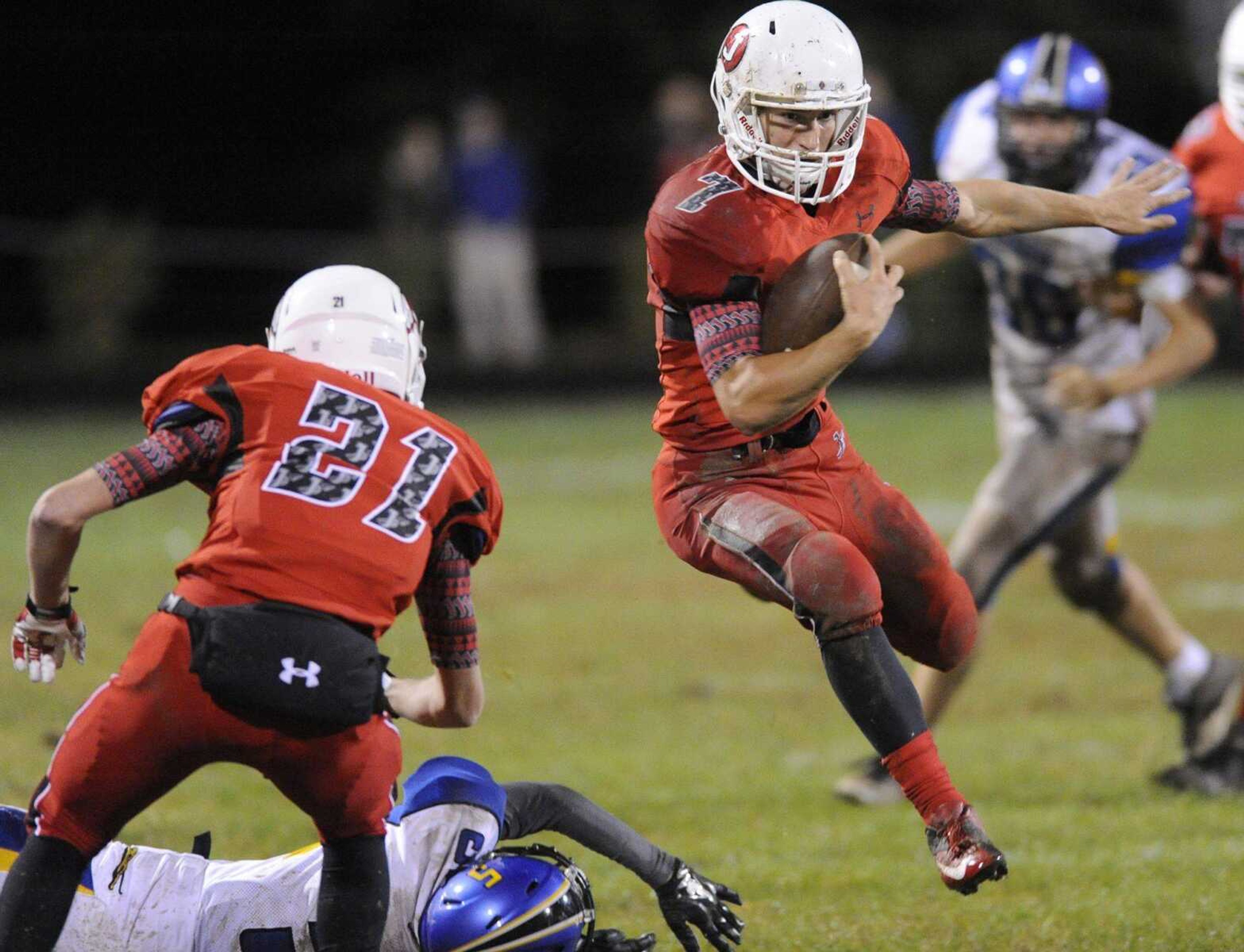 Jackson's Triston Thele carries the ball in the second quarter during the game against Seckman Friday, Oct. 10, 2014 in Jackson. (GLENN LANDBERG)