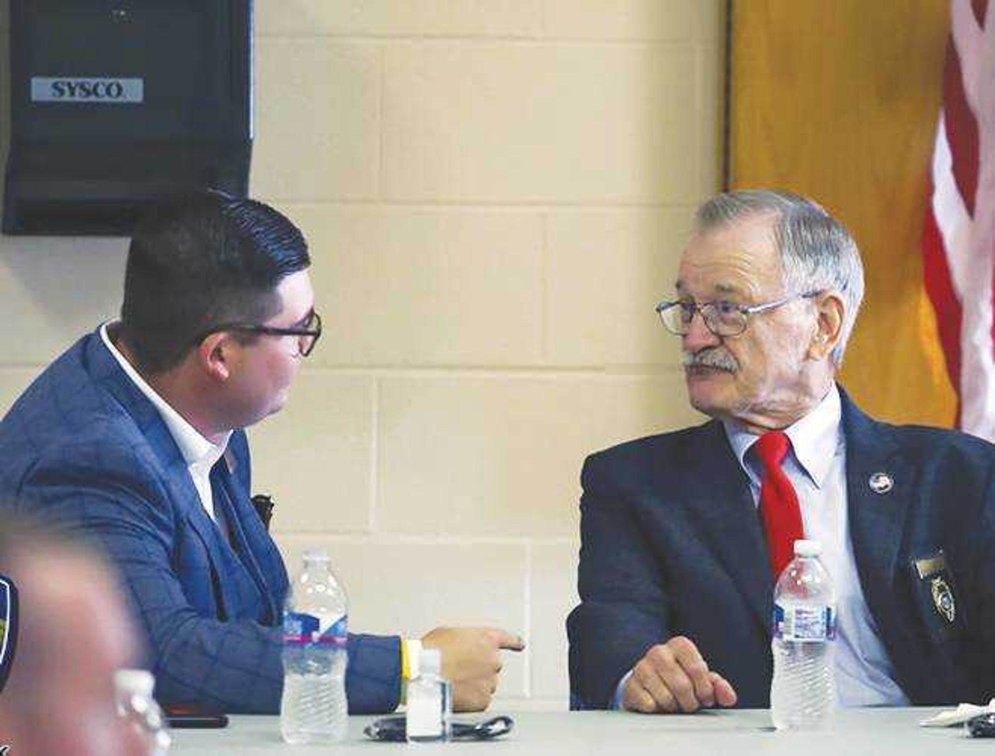 Poplar Bluff, Missouri, police chief Danny Whiteley, right, talks with Madison Baker with U.S. Sen. Roy Blunt's office Thursday regarding opioid-related deaths.