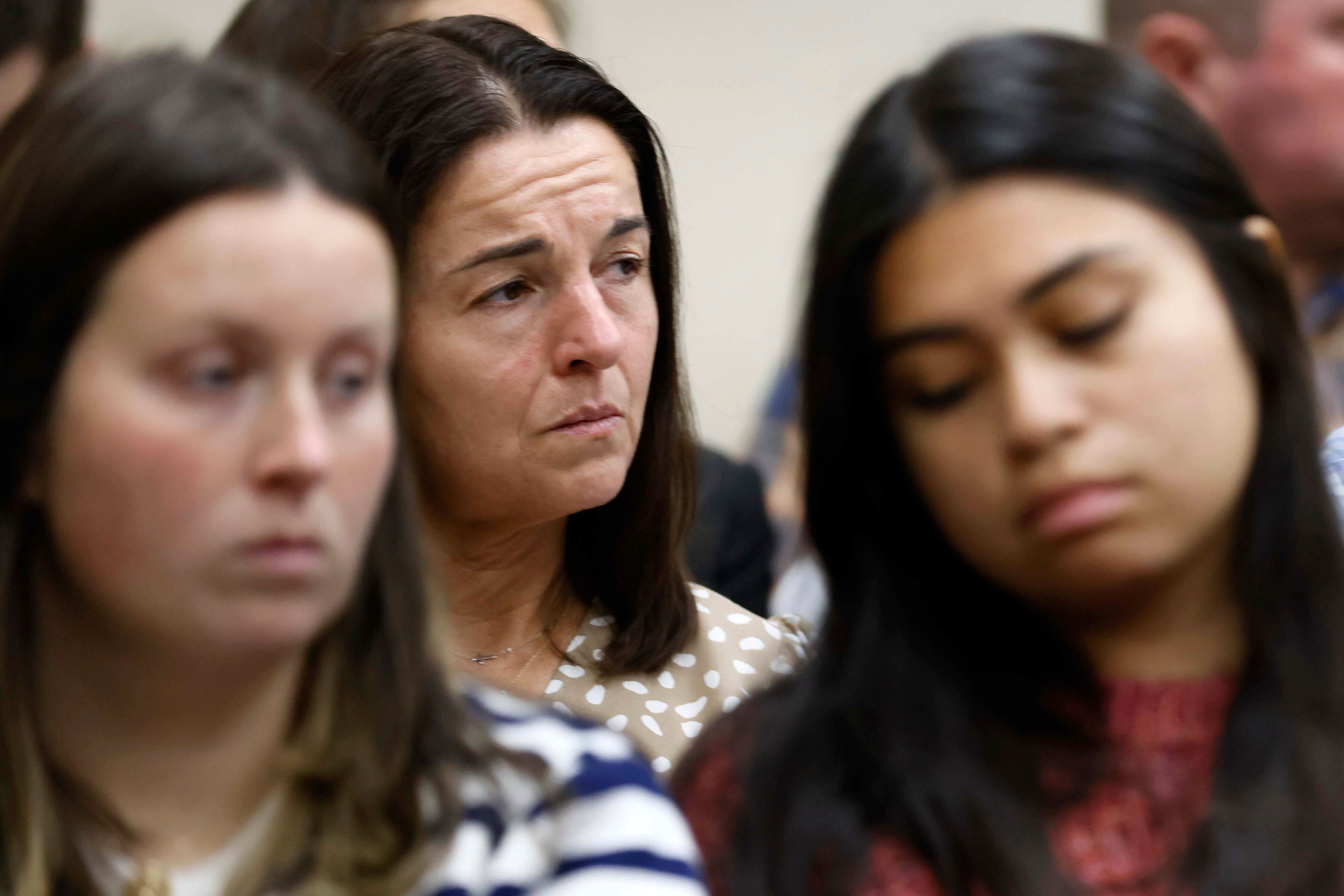 Allyson Phillips, mother of Laken Riley, second left, listens during the trial of Jose Ibarra at Athens-Clarke County Superior Court on Monday, Nov. 18, 2024, in Athens, Ga. (Miguel Martinez/Atlanta Journal-Constitution via AP, Pool)