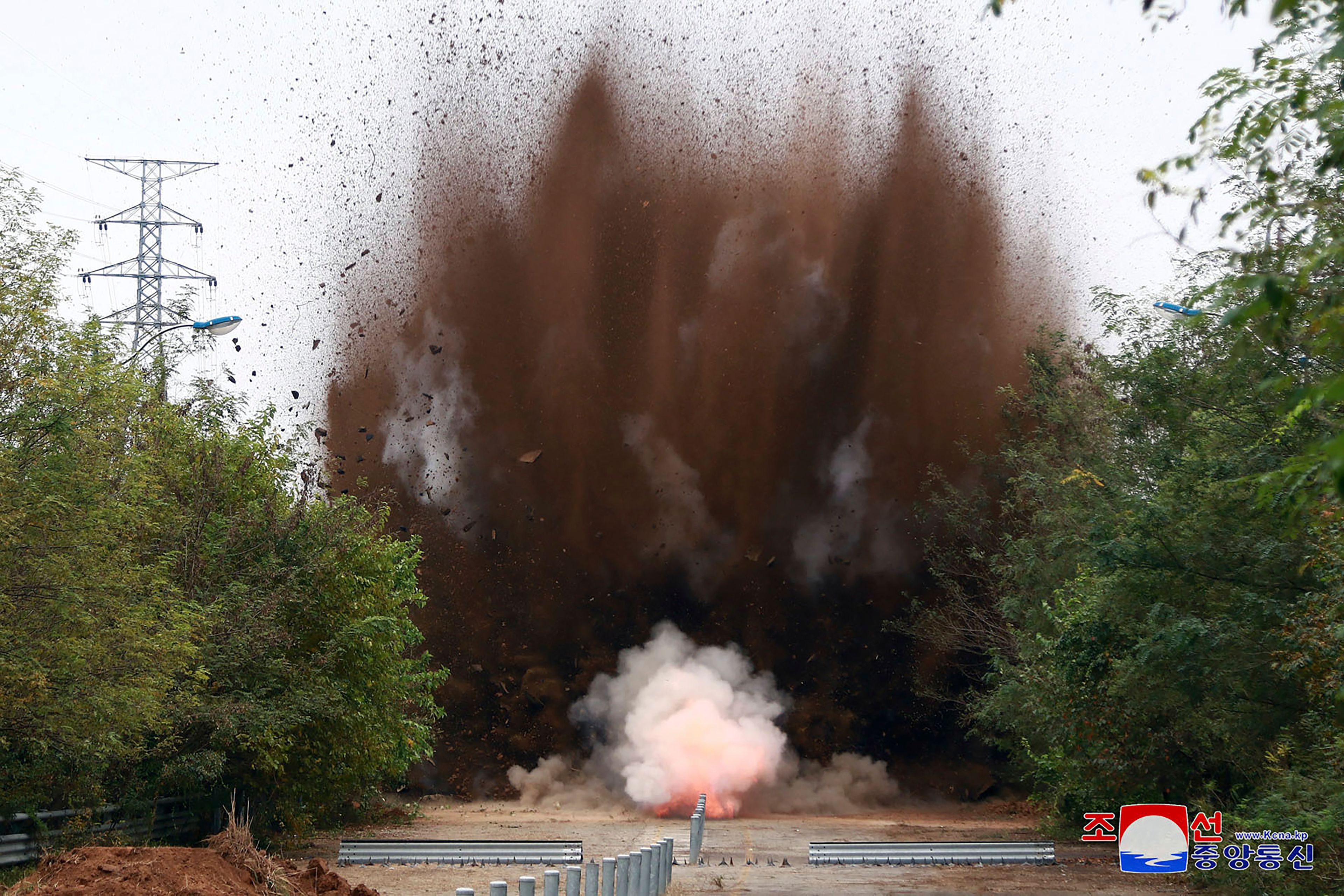 This photo provided by the North Korean government, shows a demolition of parts of the northern sections of unused road and rail links that once connected the country with the South, seen from North Korea Tuesday, Oct. 15, 2024. Independent journalists were not given access to cover the event depicted in this image distributed by the North Korean government. The content of this image is as provided and cannot be independently verified. Korean language watermark on image as provided by source reads: "KCNA" which is the abbreviation for Korean Central News Agency. (Korean Central News Agency/Korea News Service via AP)