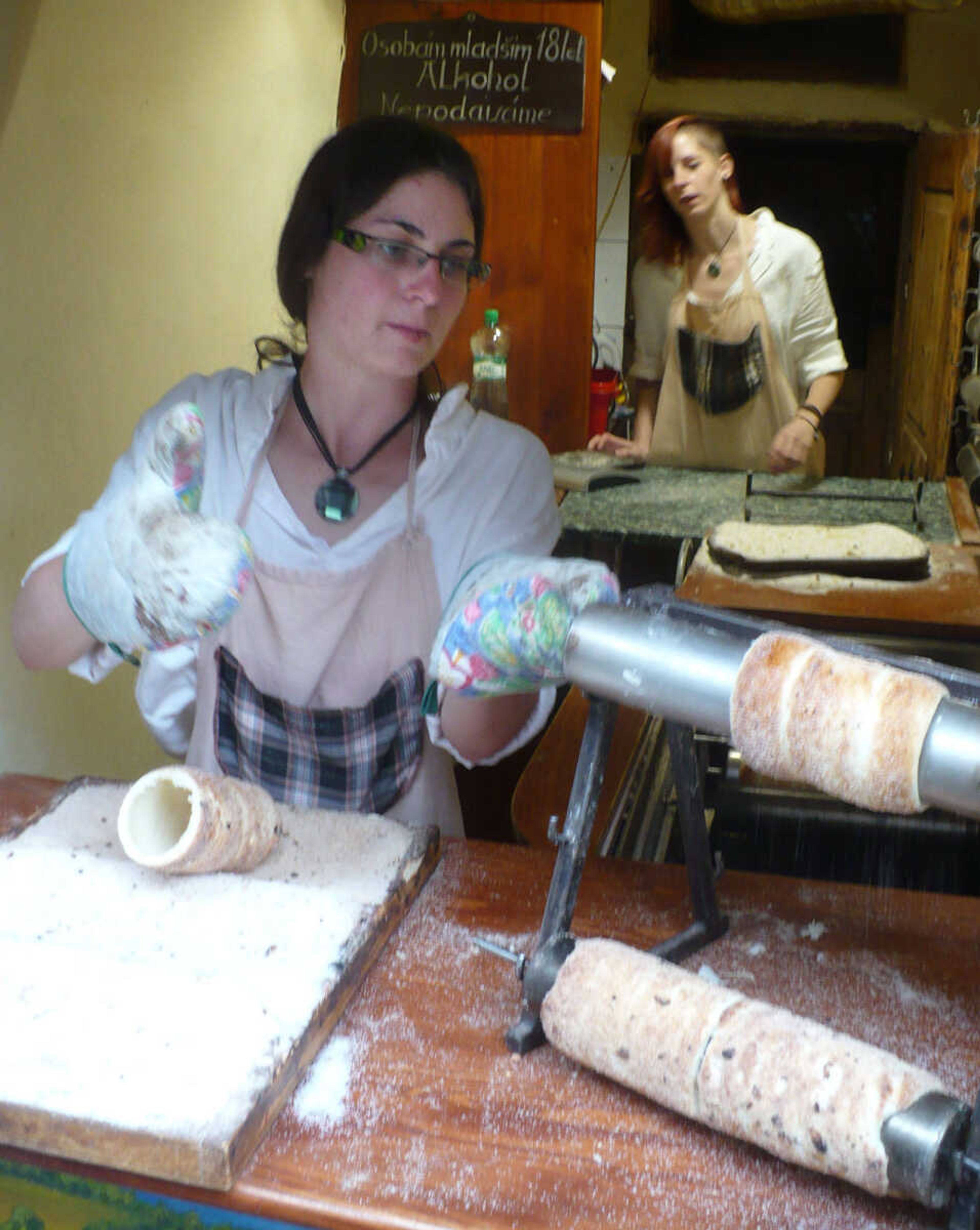 Baumkuchen, or tree cake, being prepared in a booth on a street near the Charles Bridge in Prague.