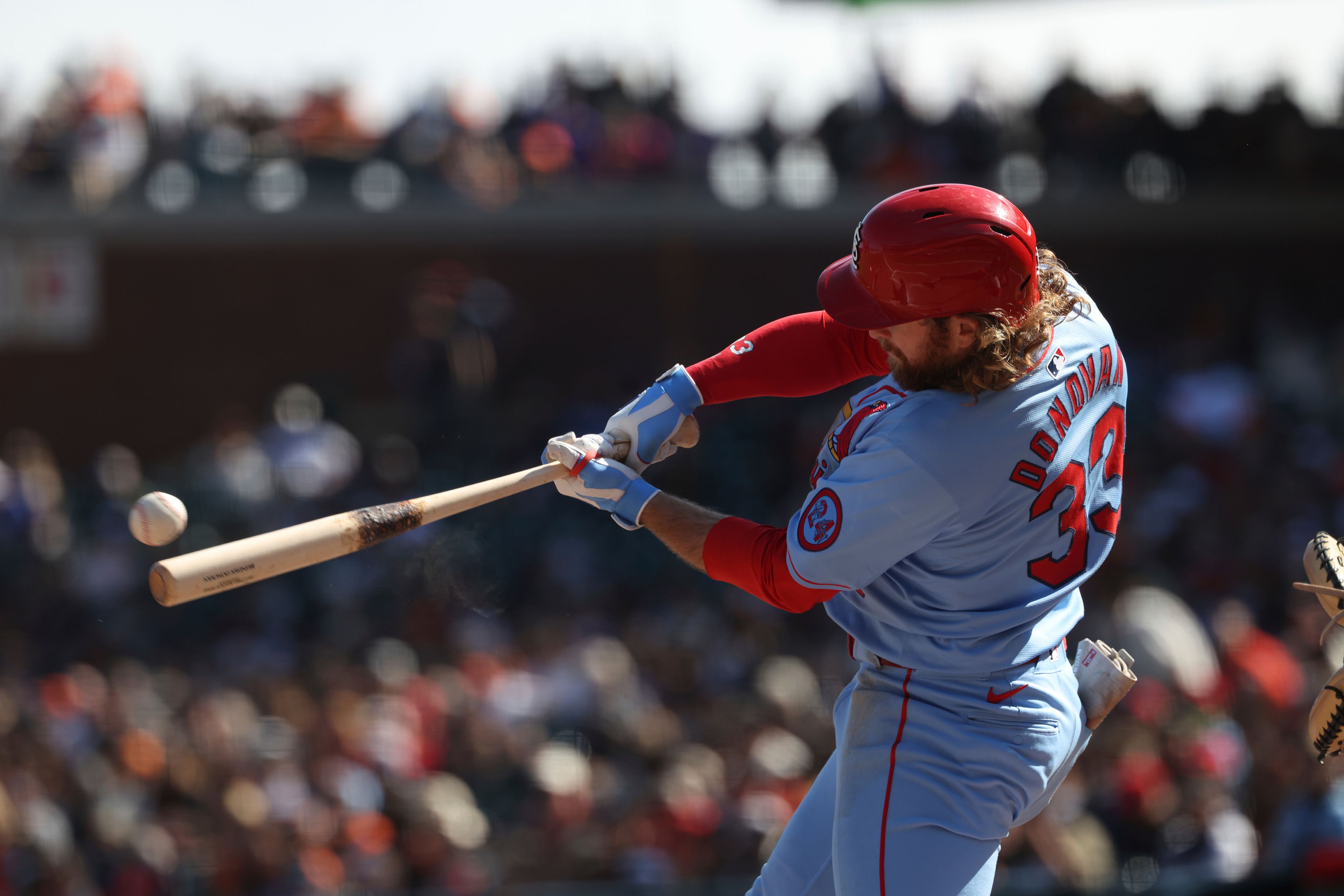 St. Louis Cardinals' Brendan Donovan (33) singles during the fifth inning of a baseball game against the San Francisco Giants in San Francisco, Saturday, Sept. 28, 2024. (AP Photo/Jed Jacobsohn)