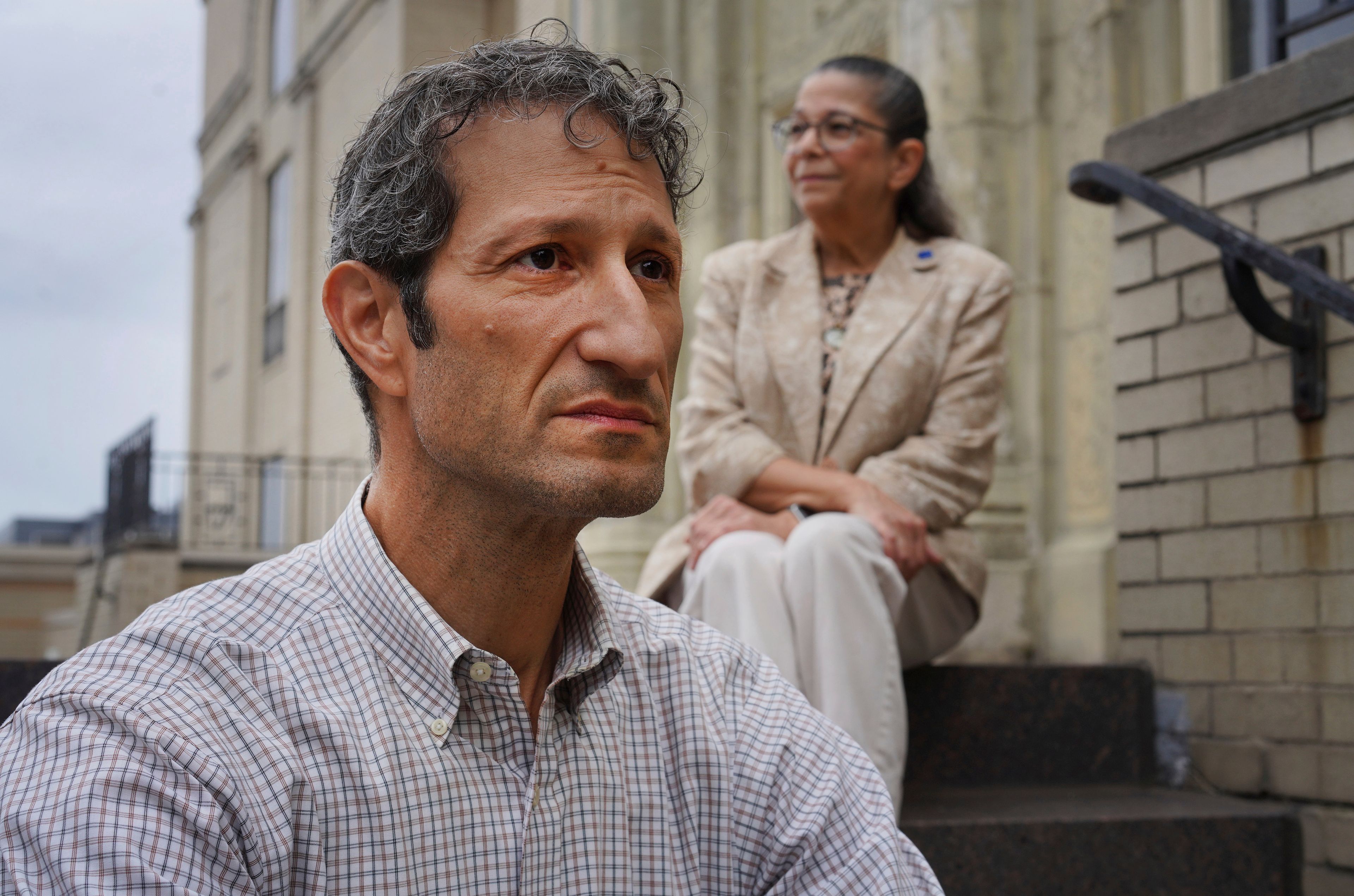 Rabbi Seth Adelson, of Congregation Beth Shalom, a Conservative synagogue located just blocks from Tree of Life in the Squirrel Hill neighborhood, sits for a portrait with Audrey Glickman, a Tree of Life member who survived the 2018 synagogue attack, Friday, Sept. 27, 2024, in Pittsburgh. (AP Photo/Jessie Wardarski)