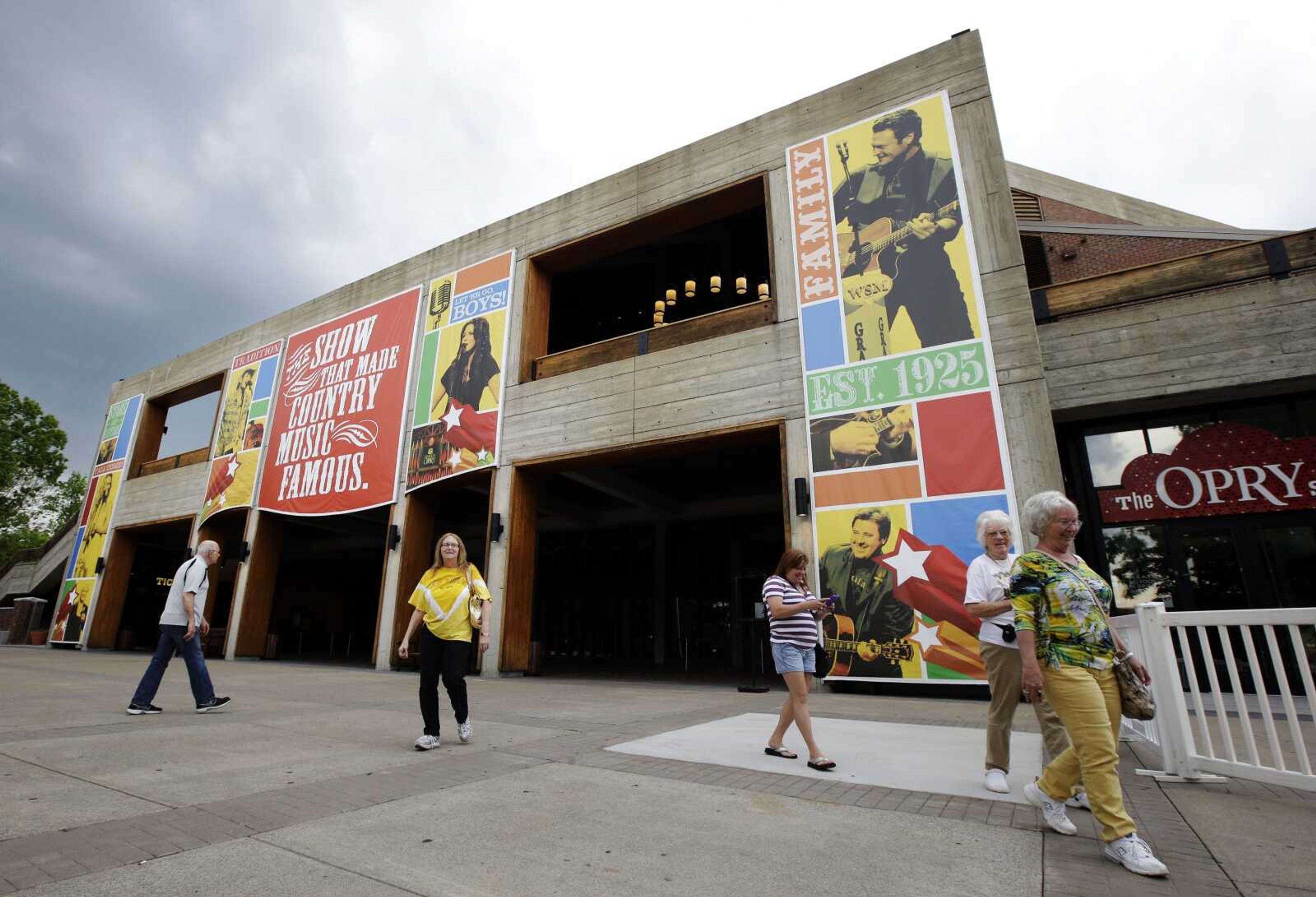 People visit the the Grand Ole Opry House in Nashville, Tennessee. A new immersive film showing at the Circle Room explains the history of the Grand Ole Opry while showing video clips of more than 100 artists on stage. The 14-minute film is hosted by Garth Brooks and Trisha Yearwood.