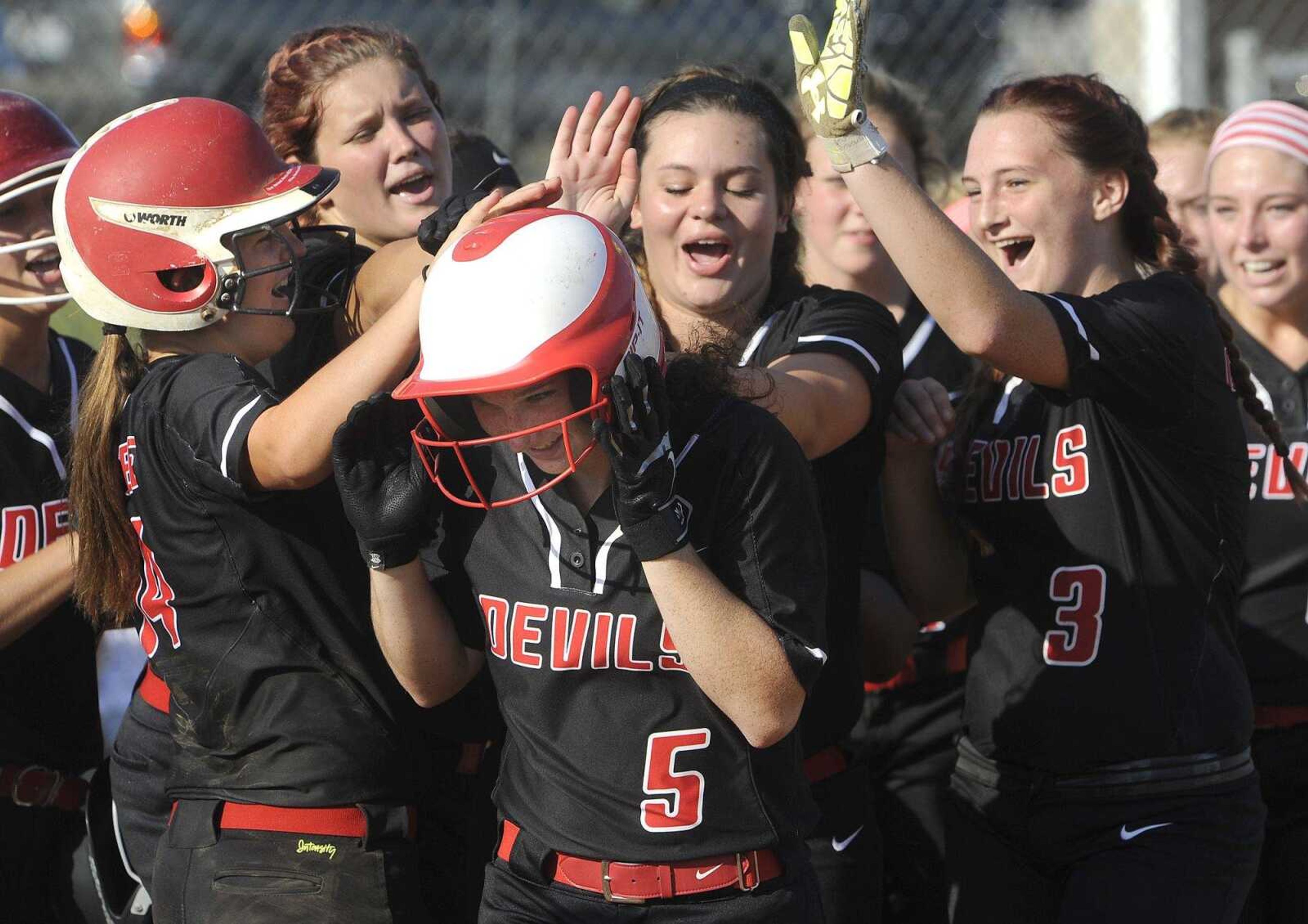 Chaffee's Bridgett Swinford is congratulated by teammates after her two-run homer against Notre Dame during the fifth inning Wednesday, Aug. 24, 2016 at Notre Dame Regional High School.