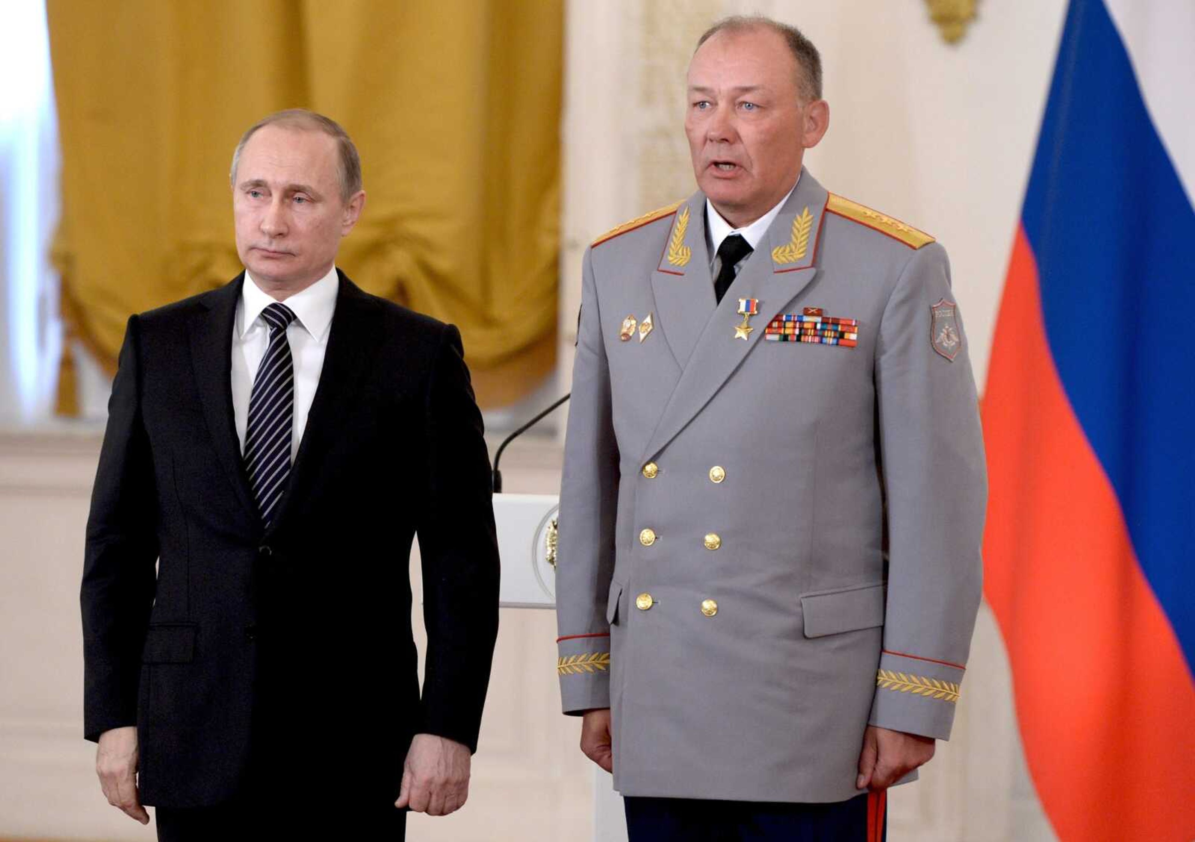 Russian President Vladimir Putin, left, poses with Col. Gen. Alexander Dvornikov during an awarding ceremony March 17, 2016, in Moscow's Kremlin, Russia. Russia has appointed Dvornikov as new Ukraine war commander, a top U.S. official said Sunday.