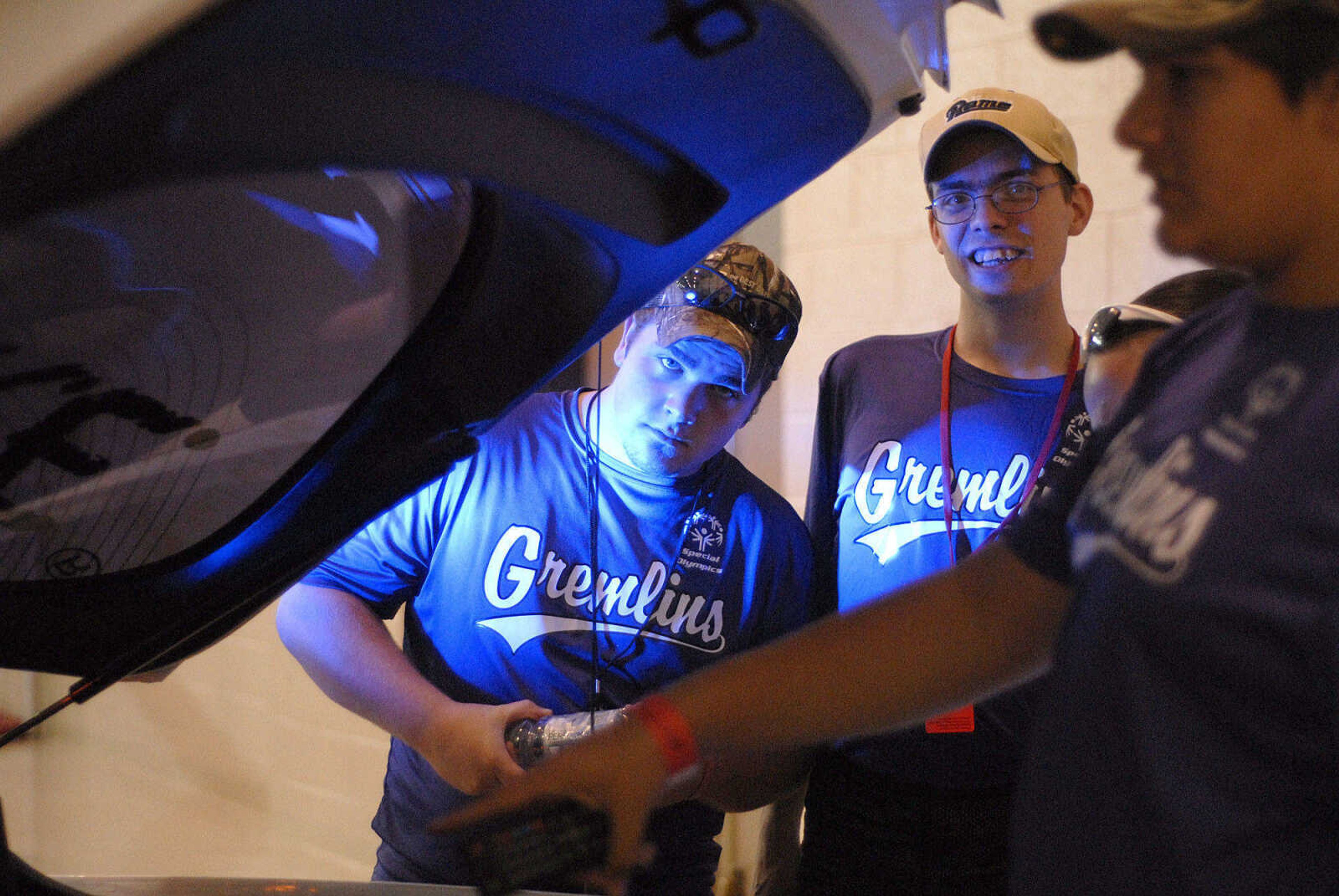 LAURA SIMON ~ lsimon@semissourian.com
Zachary Rhoads, left, and Troy Smith check out the inside of the D.A.R.E. car at Victory Village inside the the Osage Centre Saturday, August 13, 2011 in Cape Girardeau.