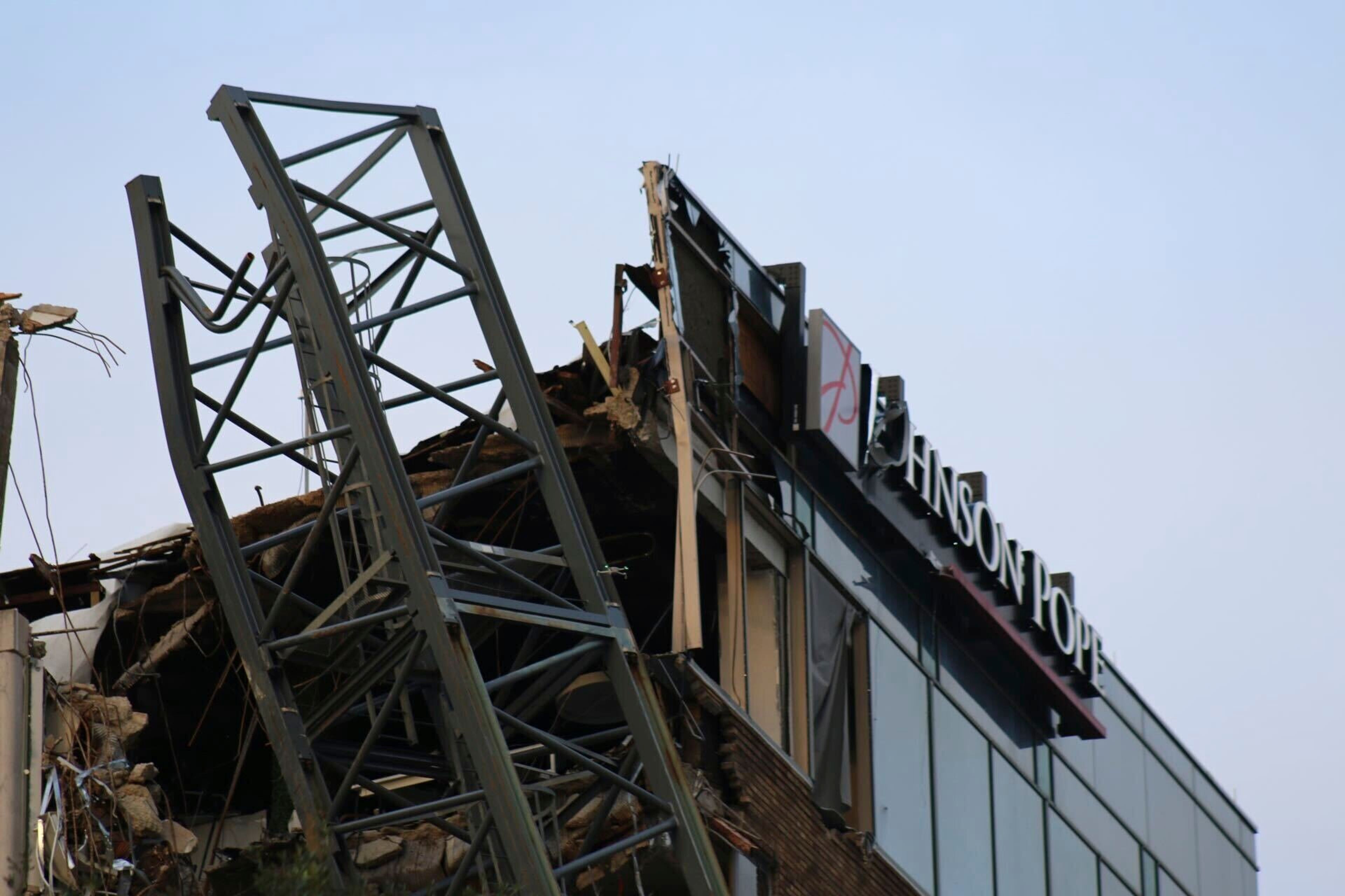 A construction crane fell over over into an office building that houses the Tampa Bay Times headquarters, after Hurricane Milton Thursday, Oct. 10, 2024. (Tampa Bay Times via AP)