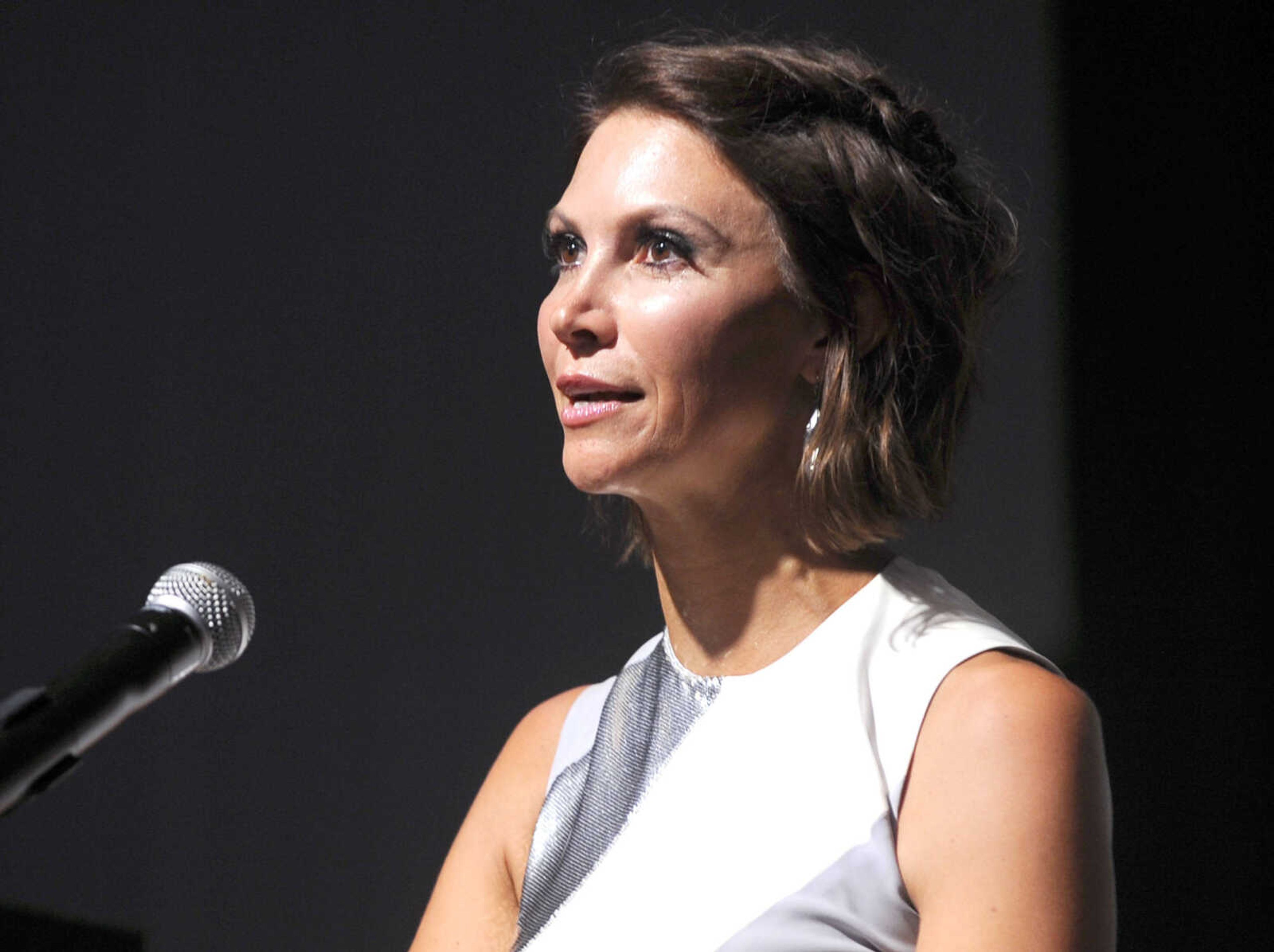 Victoria Moon welcomes people to the American Cancer Society Gala, "Destination Cure," Saturday, Sept. 23, 2017 at the Cape Girardeau Regional Airport.