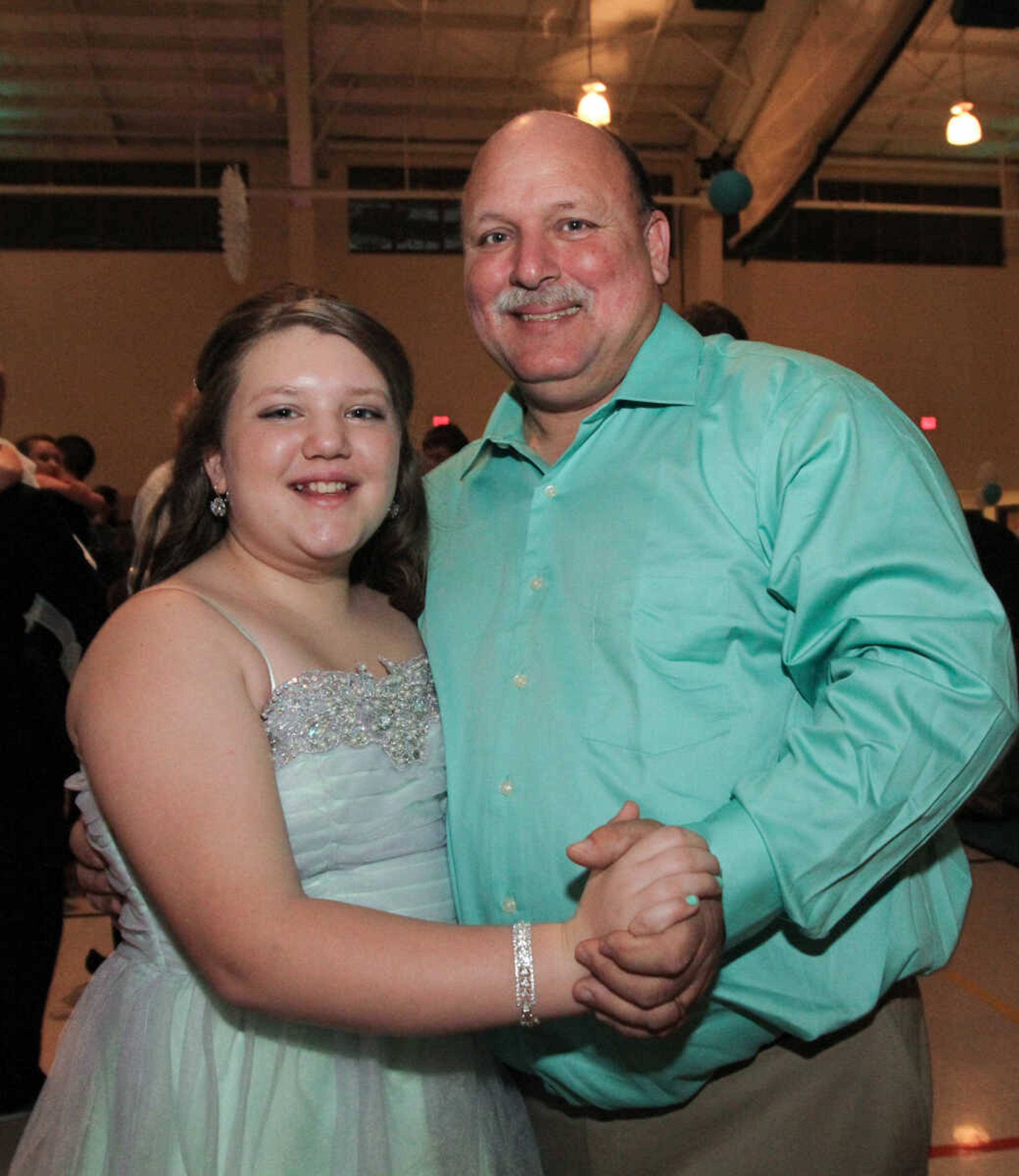 GLENN LANDBERG ~ glandberg@semissourian.com

Dean Berry and his daughter Zoe pose for a photo during the 7th annual Father/Daughter Dance Saturday, Feb. 21, 2015 at the Osage Centre.