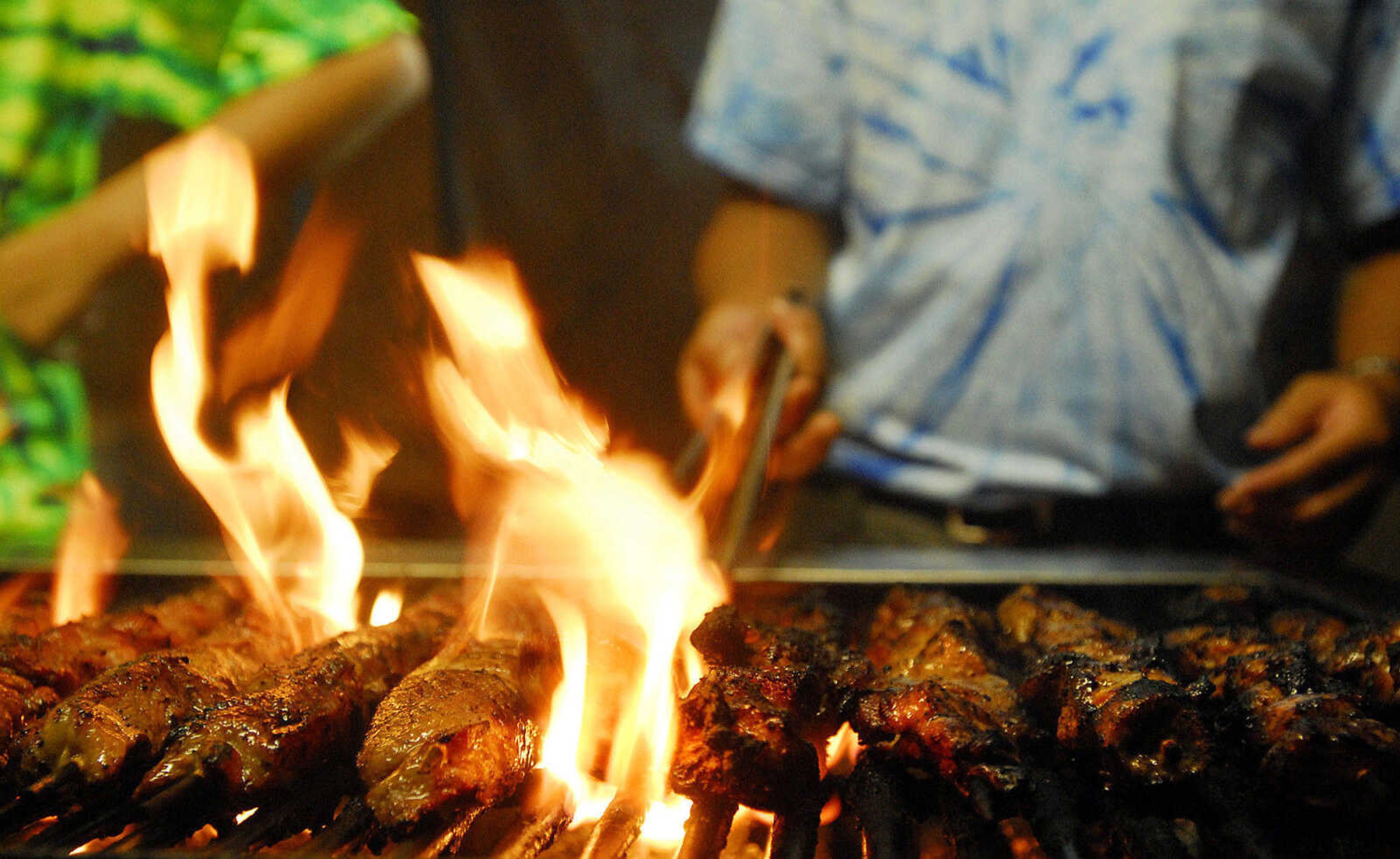 LAURA SIMON~lsimon@semissourian.com
Pork kabobs line the grill Thursday, September 16, 2010 during the 155th Annual SEMO District Fair.