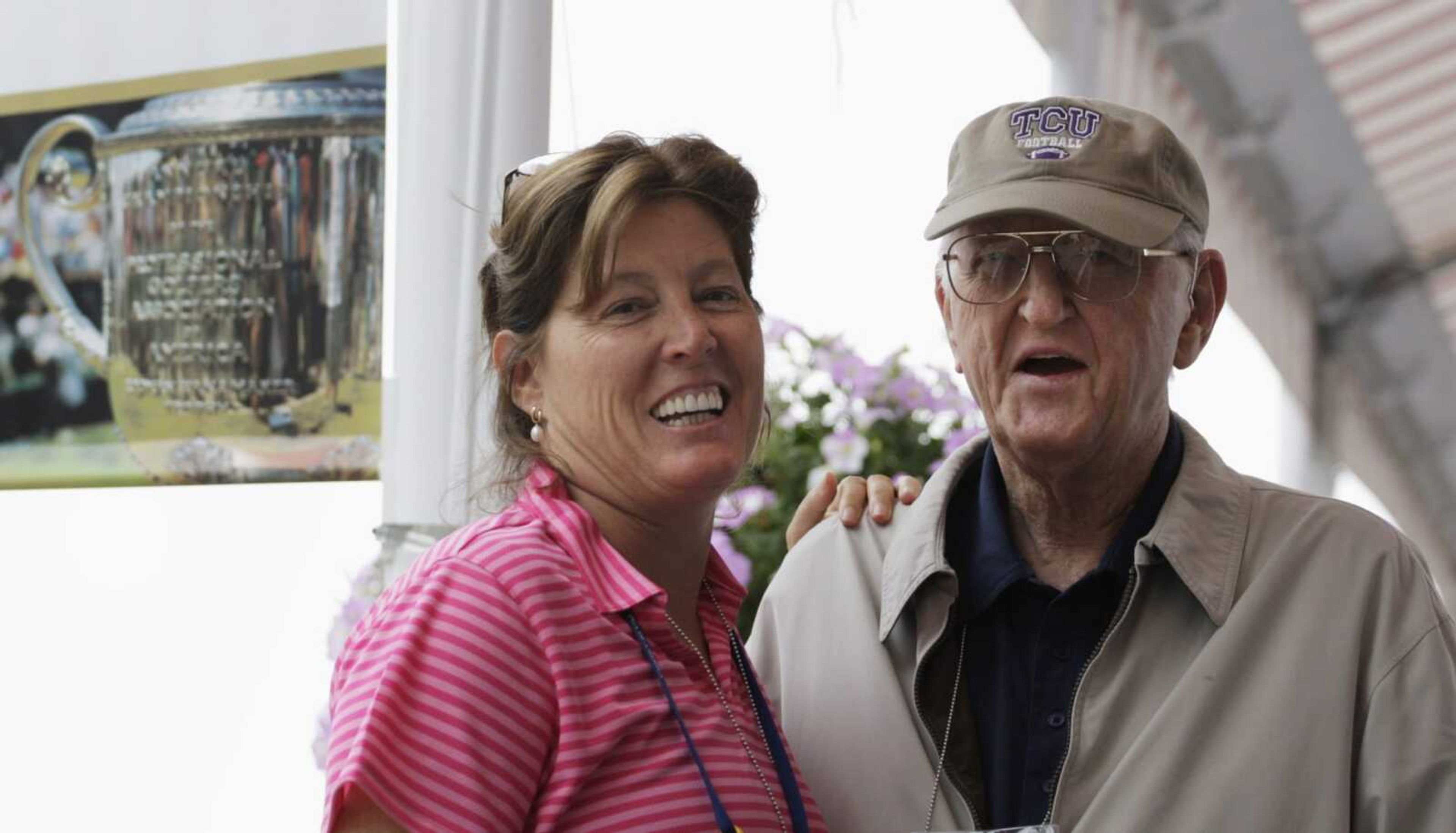 Sports writer Dan Jenkins, right, stands next to his daughter, Sally Jenkins, at the 2009 PGA Championship at Hazeltine National Golf Club in Chaska, Minnesota.