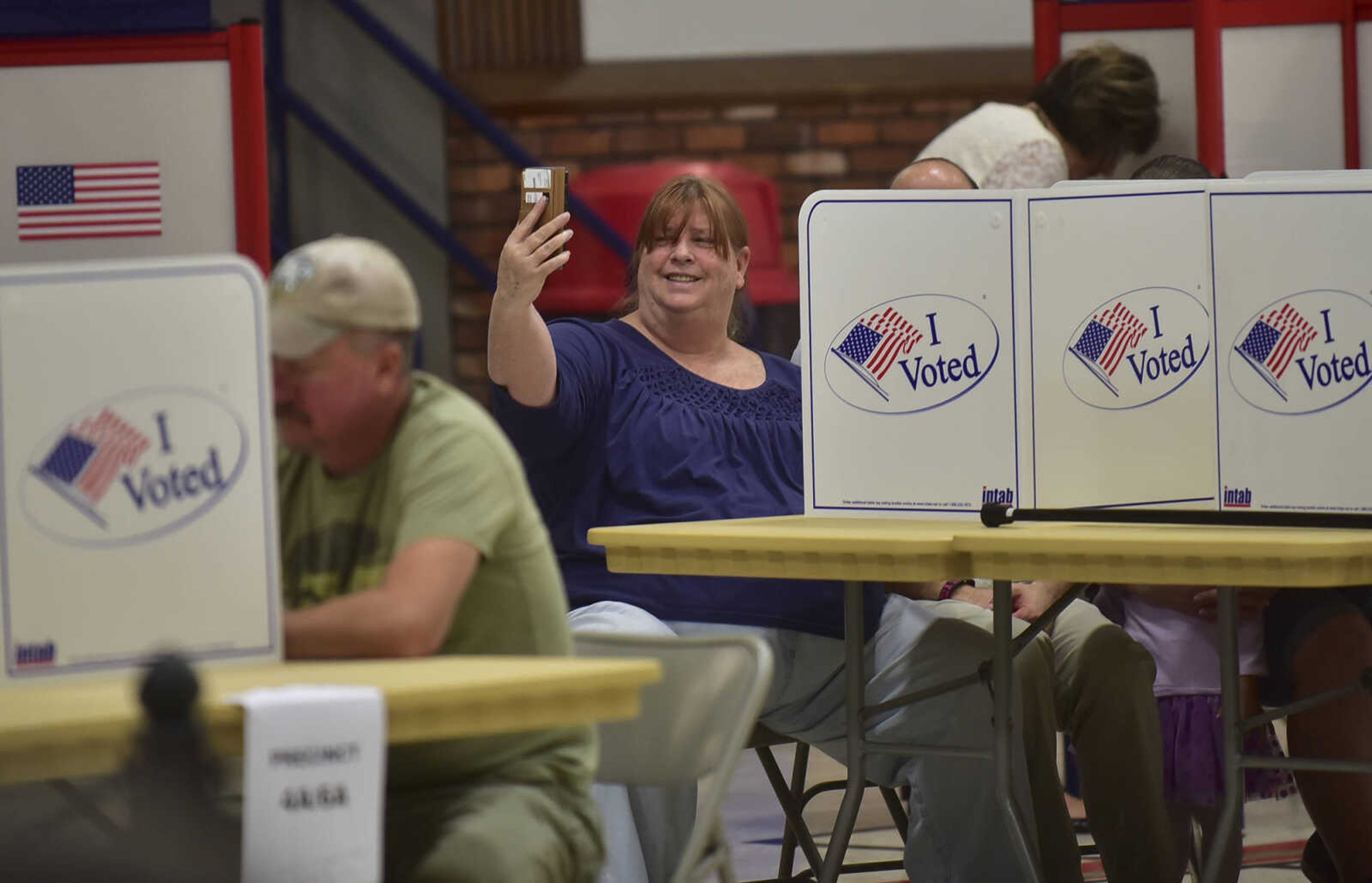 ANDREW J. WHITAKER ~ awhitaker@semissourian.com
"This was the first time we had voted in awhile, so we decided to take a photo." Laurie Goettl said after she votes at the Arena Building Tuesday, Nov. 8, 2016 in Cape Girardeau.