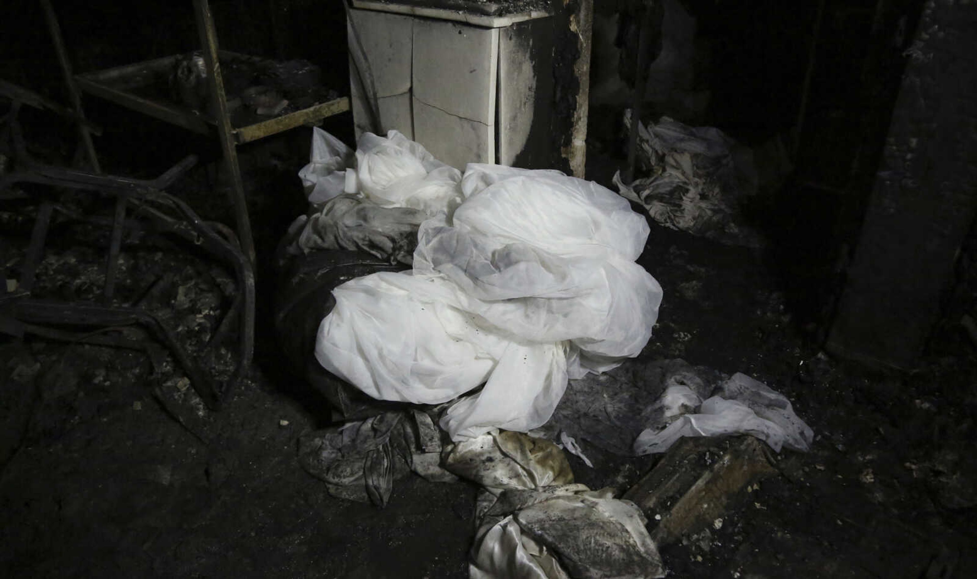 A view shows the aftermath of a fire that broke out during a wedding celebration, in the district of Hamdaniya in Mosul, Iraq, Wednesday, Sept. 27, 2023. A fire that raced through a hall hosting a Christian wedding in northern Iraq killed multiple people, authorities said Wednesday.(AP Photo/Farid Abdulwahed)