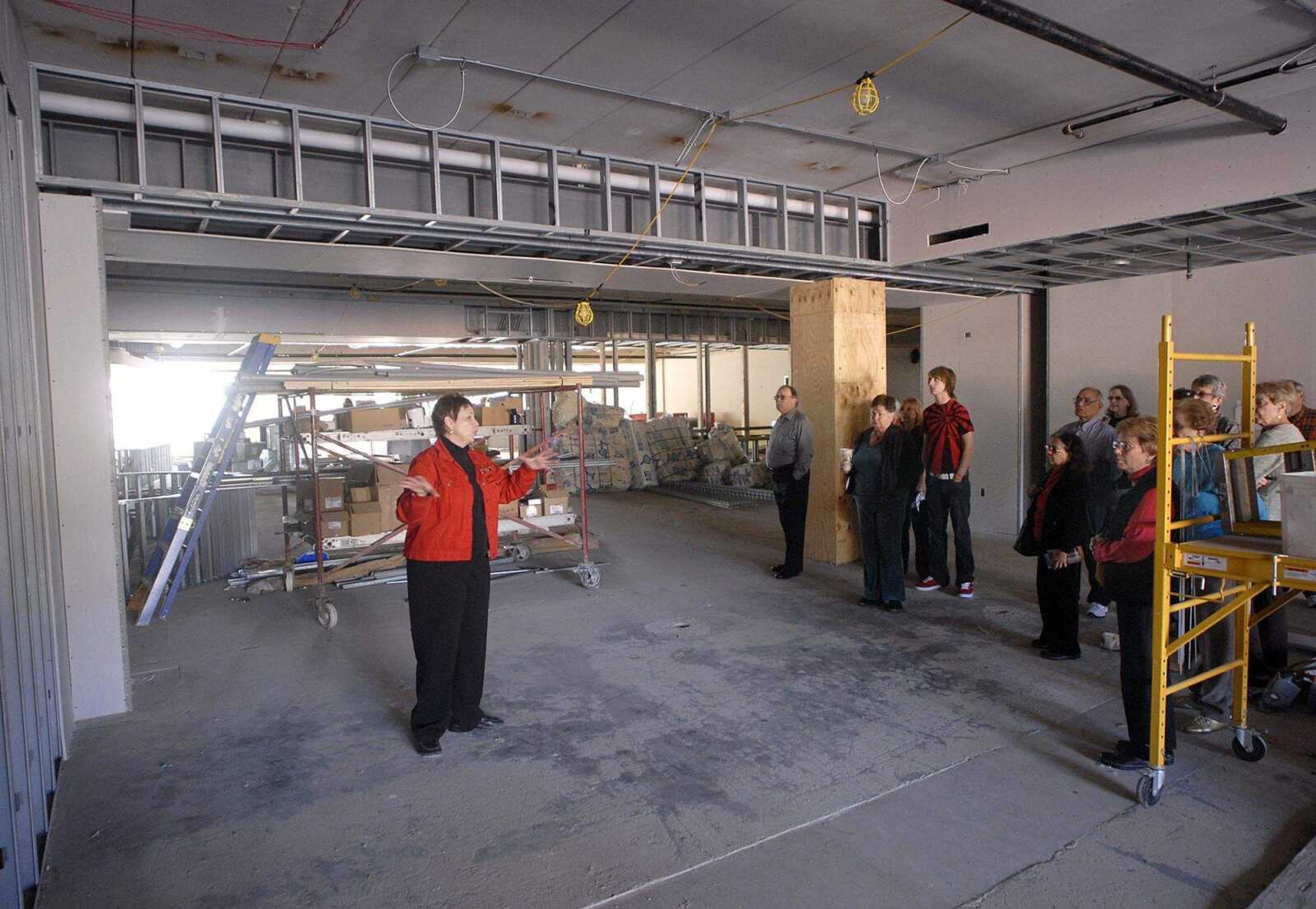 FRED LYNCH ~ flynch@semissourian.com
Cape Girardeau Public Library director Betty Martin leads a tour of the new library building that is under construction.