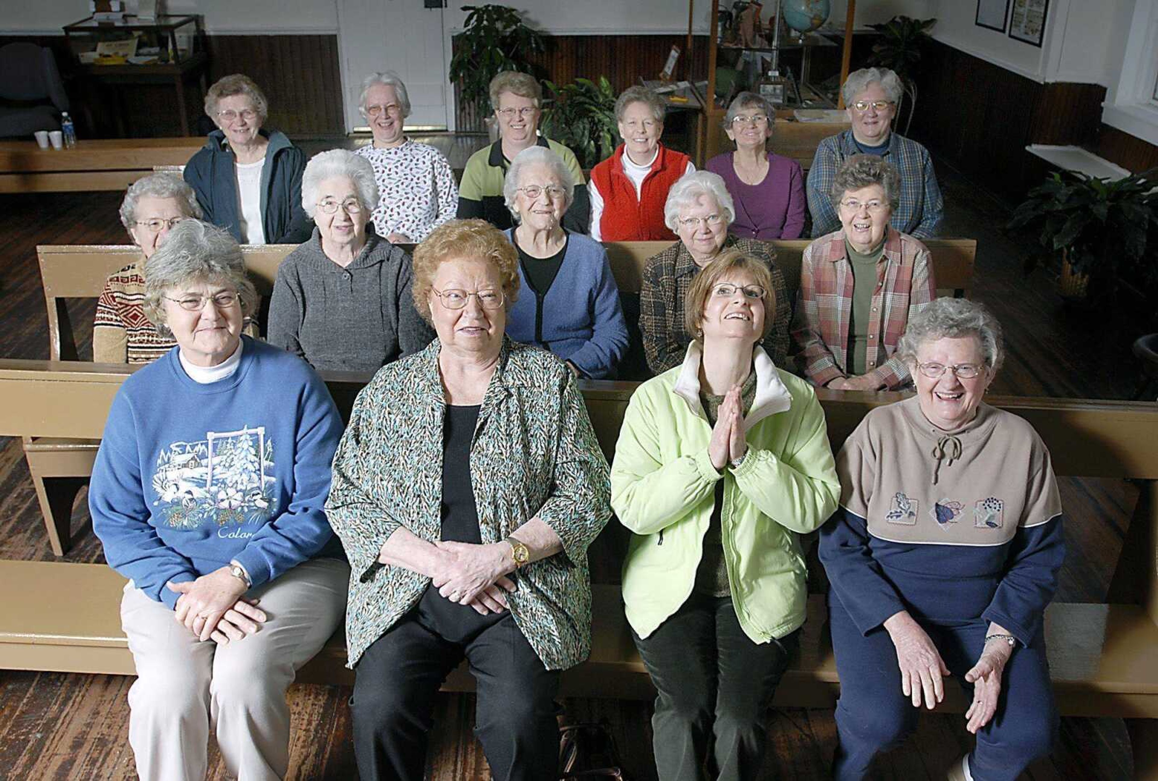 Some of the Altenburg cleaning ladies posed Feb. 11 at the Lutheran Heritage Center and Museum. (Kit Doyle)