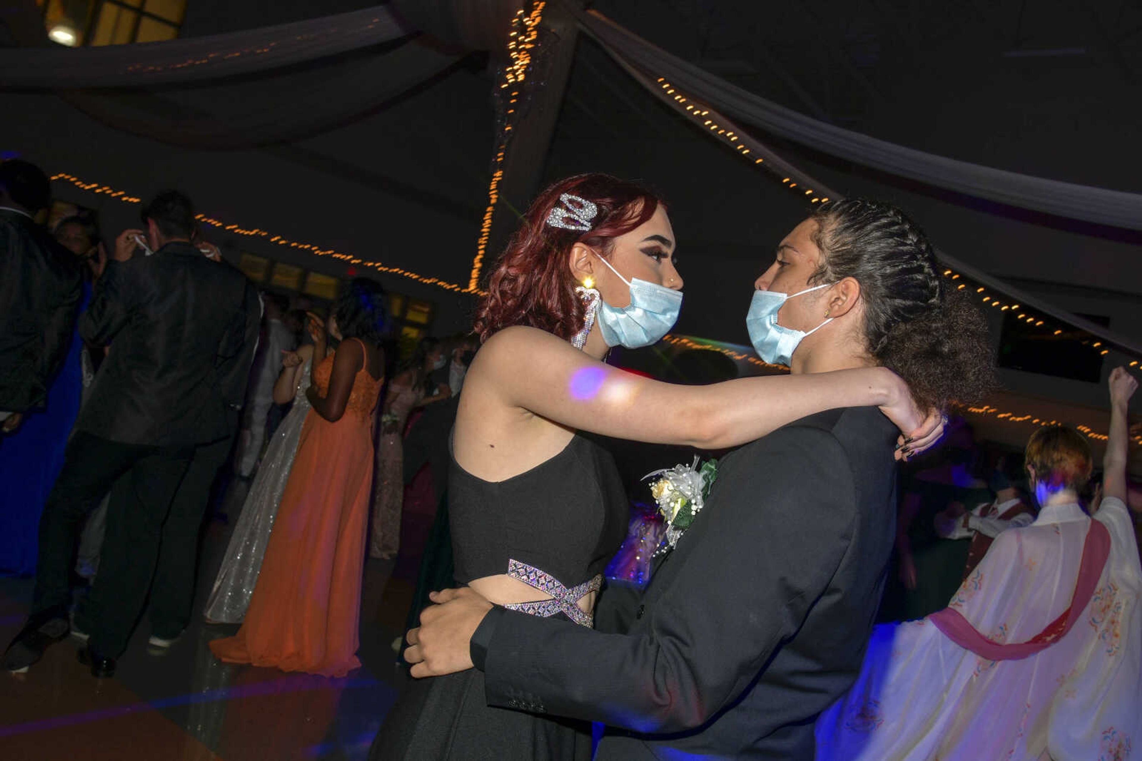 Aliza Parker and Amari Green dance during the prom at Cape Central High School in Cape Girardeau on Saturday, May 8, 2021.