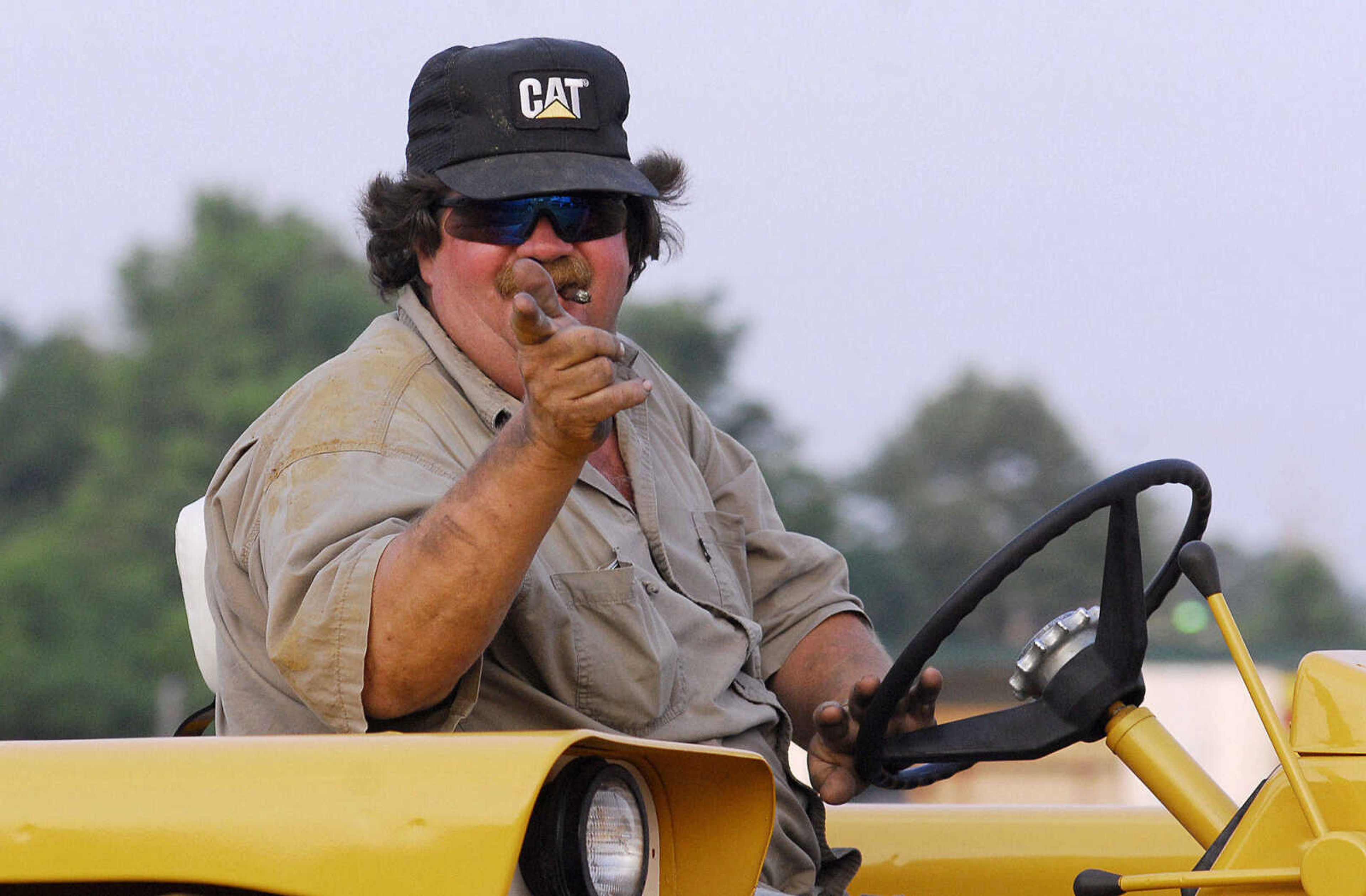 LAURA SIMON~lsimon@semissourian.com
An employee grates the course Saturday, May 29, 2010 during the "Pullin' for St. Jude" tractor and truck pull at Arena Park.