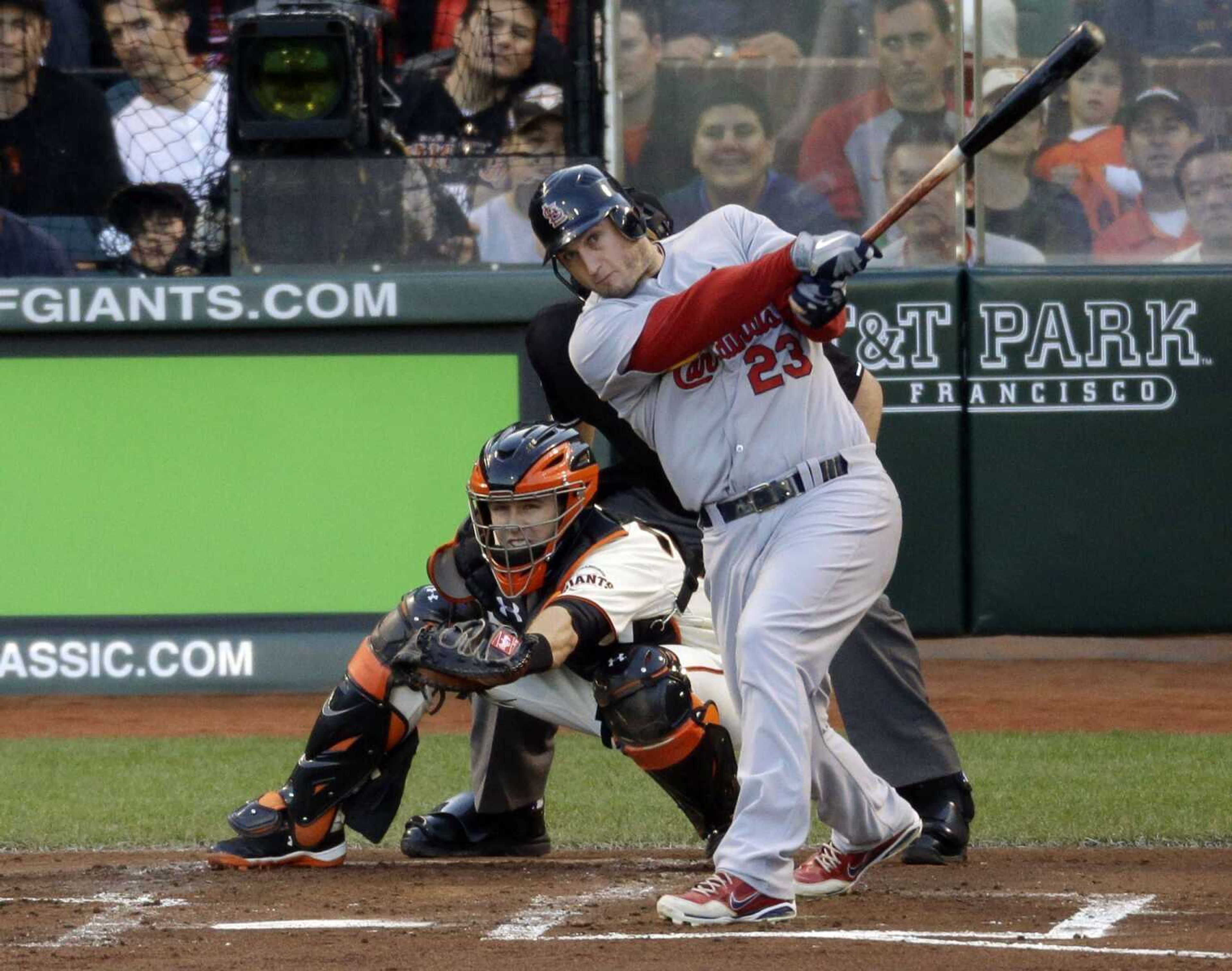 St. Louis Cardinals' David Freese hits a two-run home run during the second inning of Game 1 of baseball's National League championship series against the San Francisco Giants Sunday, Oct. 14, 2012, in San Francisco. (AP Photo/Mark Humphrey)