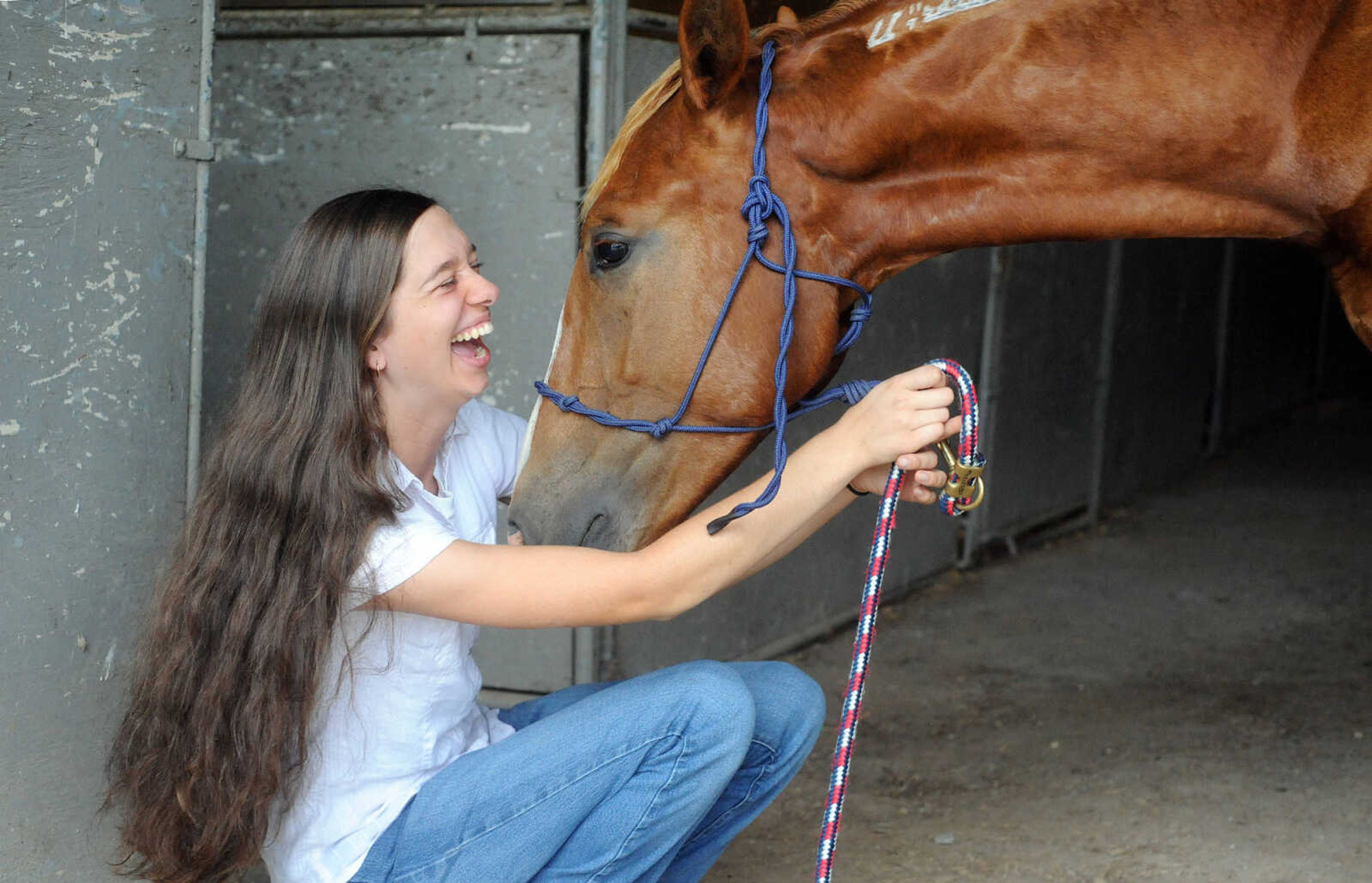 LAURA SIMON ~ lsimon@semissourian.com

Allison Elfrink and her wild mustang, Chico, at Flickerwood Arena in Jackson, Missouri, Wednesday, Aug. 5, 2015.